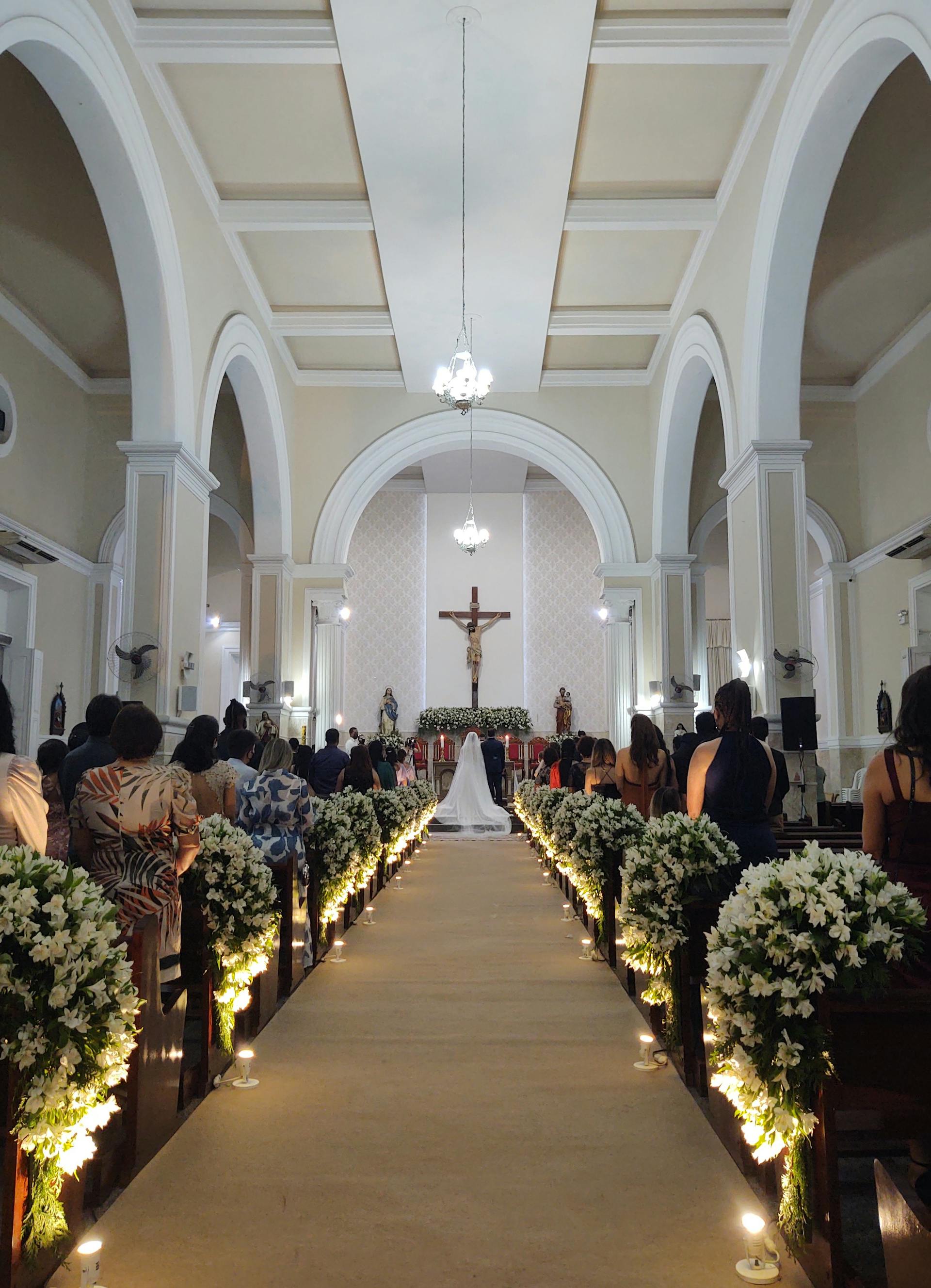 A chapel filled with guests attending a wedding | Source: Pexels