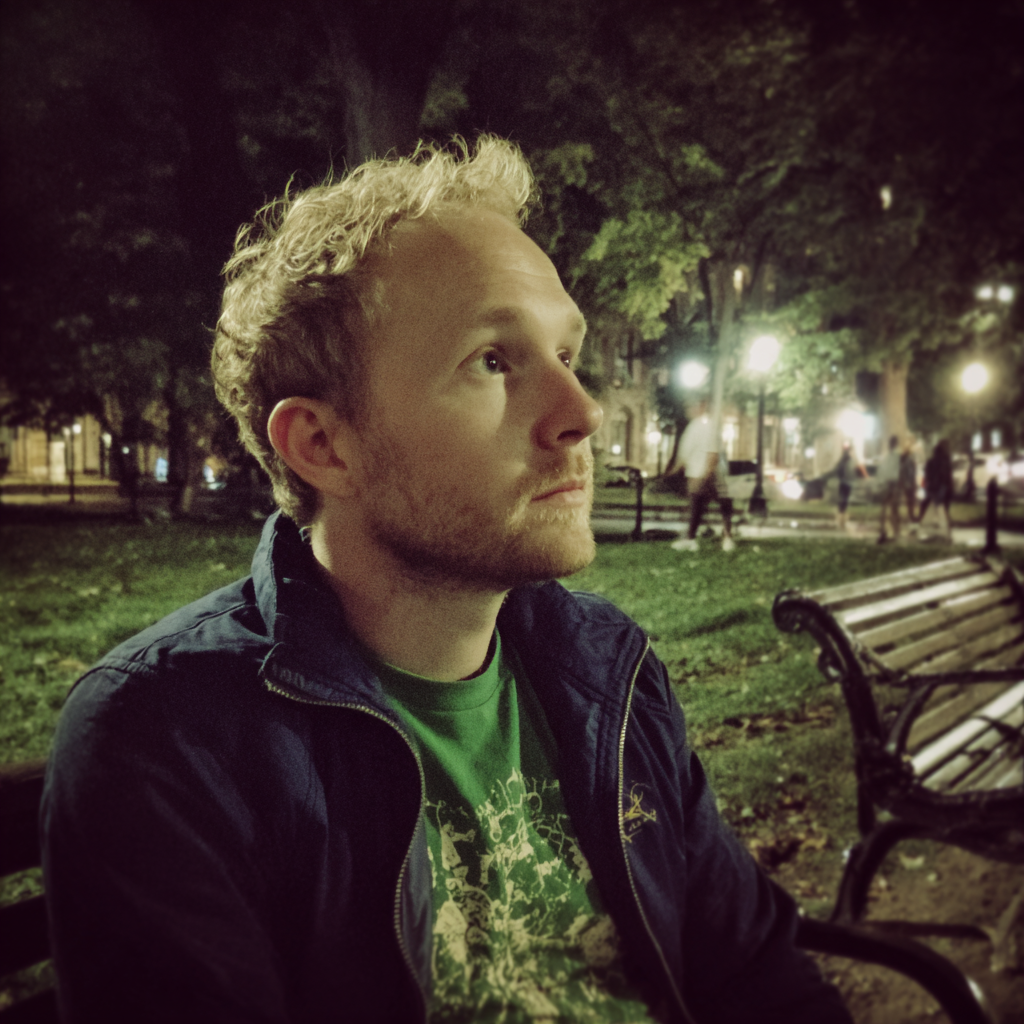 A pensive man sitting outside on a bench | Source: Midjourney