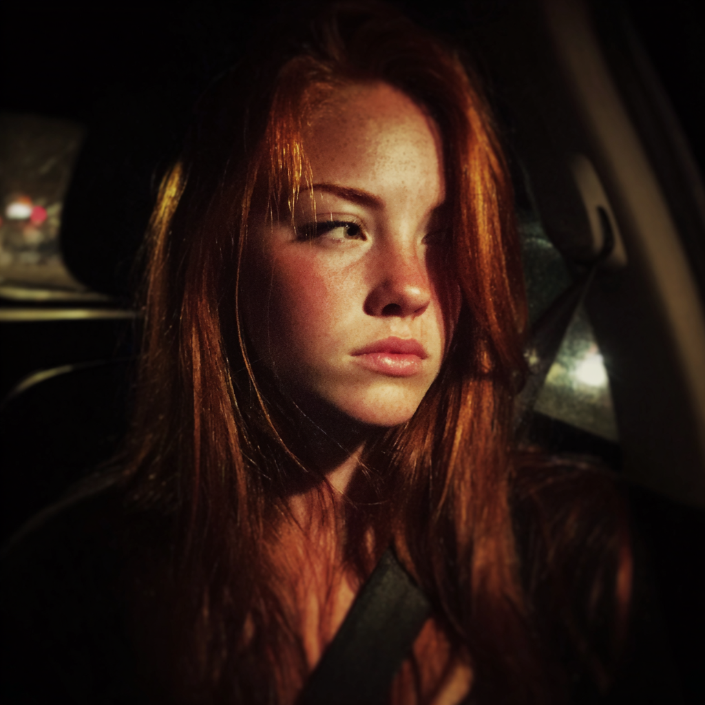 An upset woman sitting in a car | Source: Midjourney