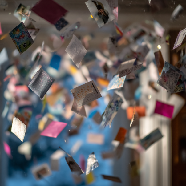 Text messages, hotel receipts, and glossy photos fluttering through the air | Source: Midjourney