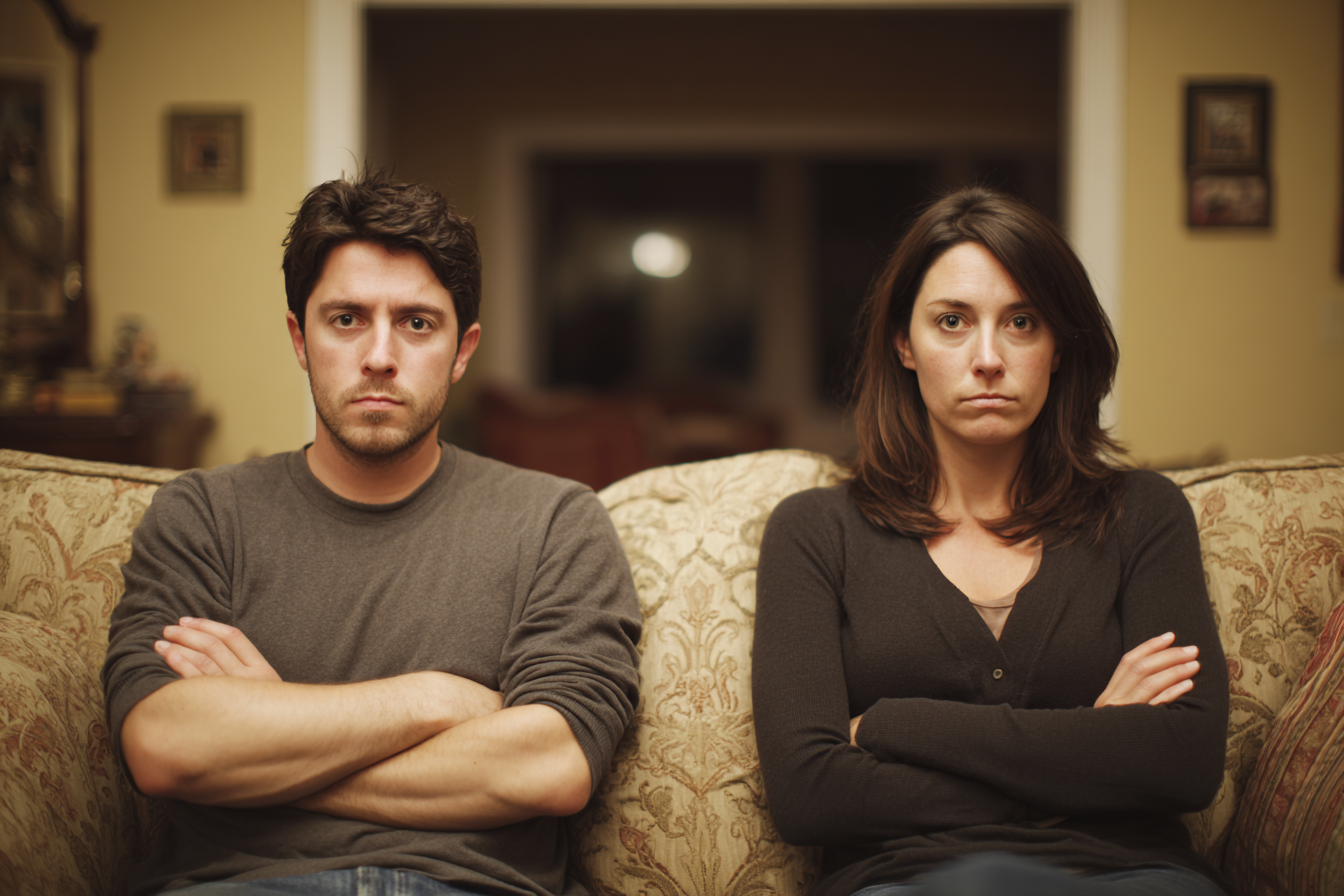 Two people sitting on a sofa | Source: Midjourney