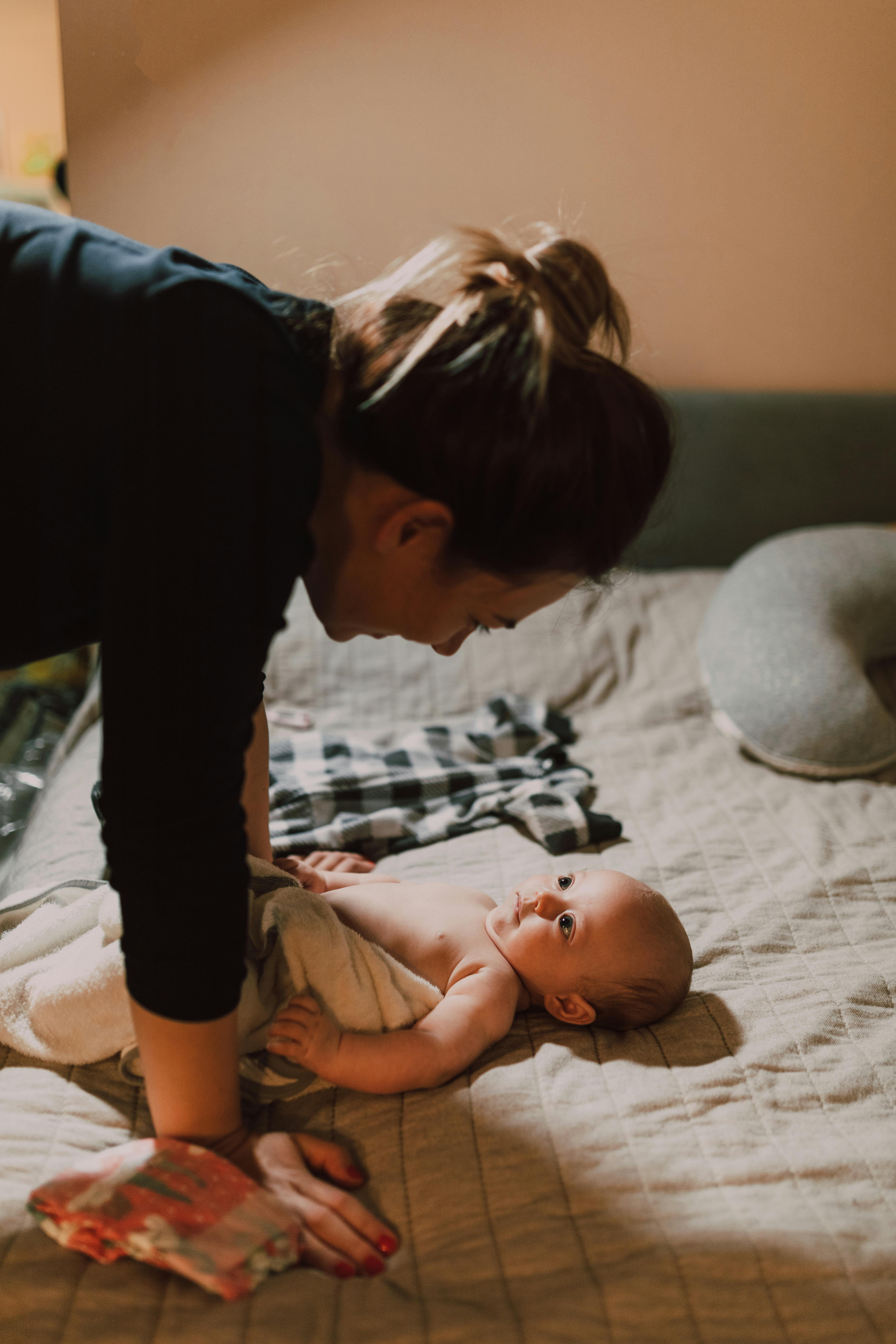 A mother and her newborn | Source: Pexels