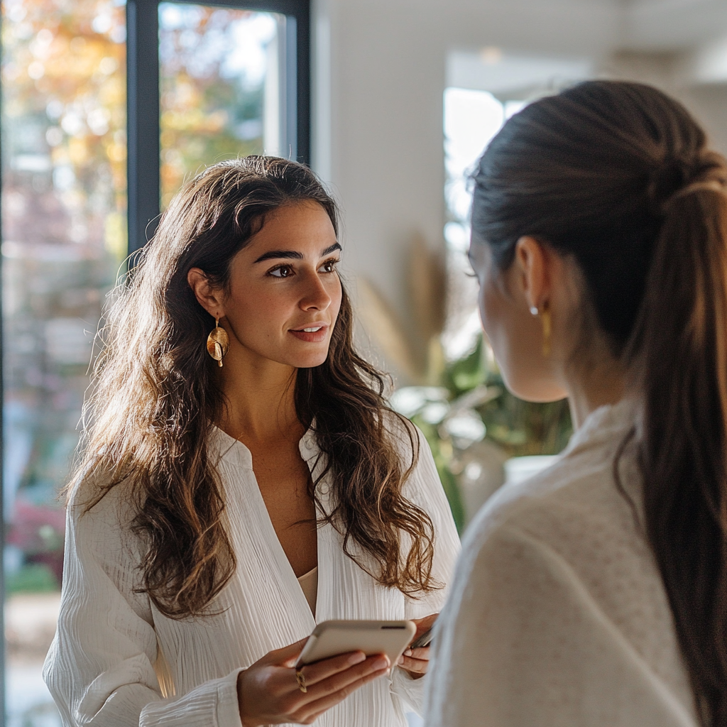 Women having a conversation | Source: Mdijourney