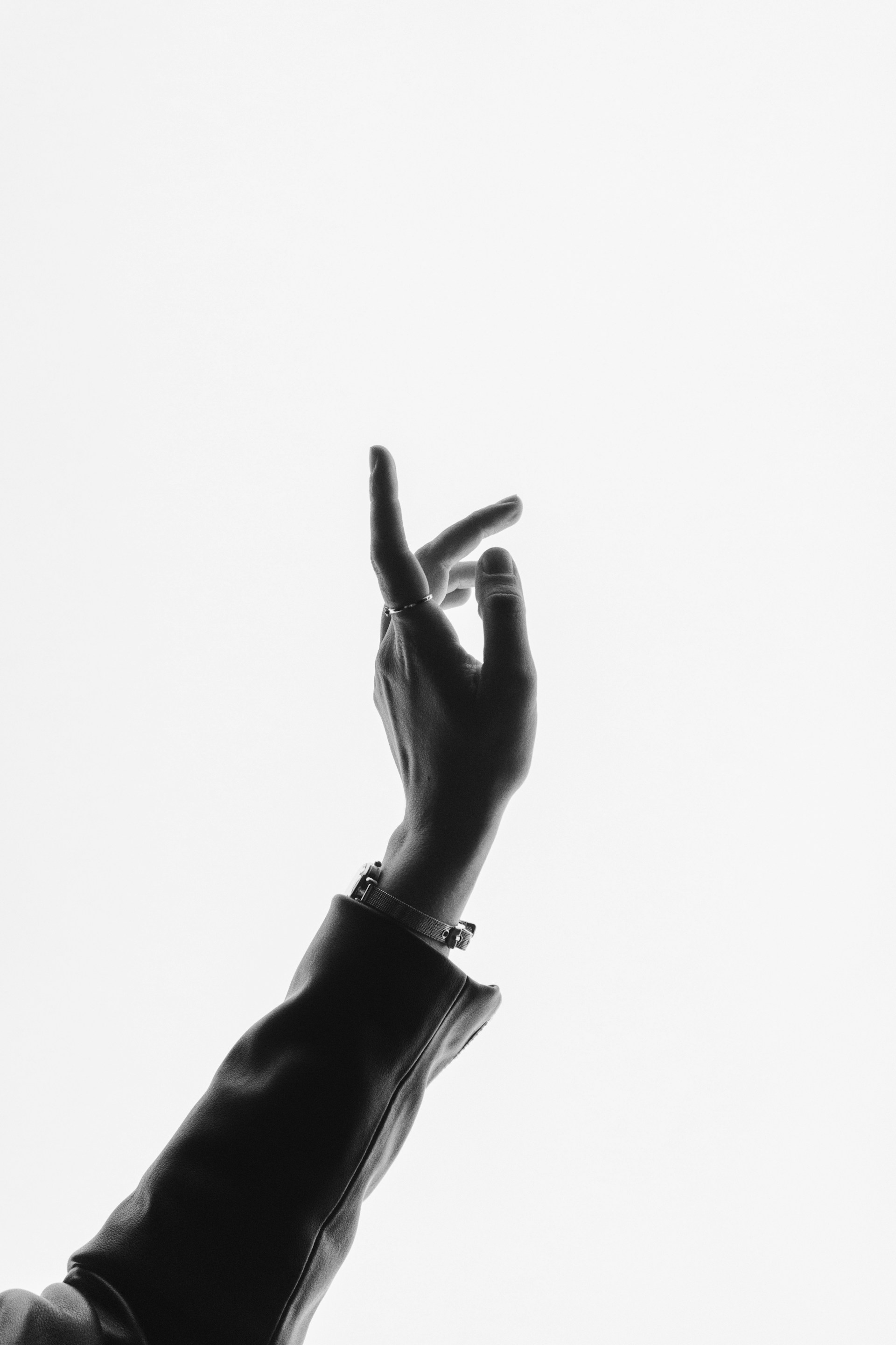 A woman gesturing with one hand | Source: Unsplash
