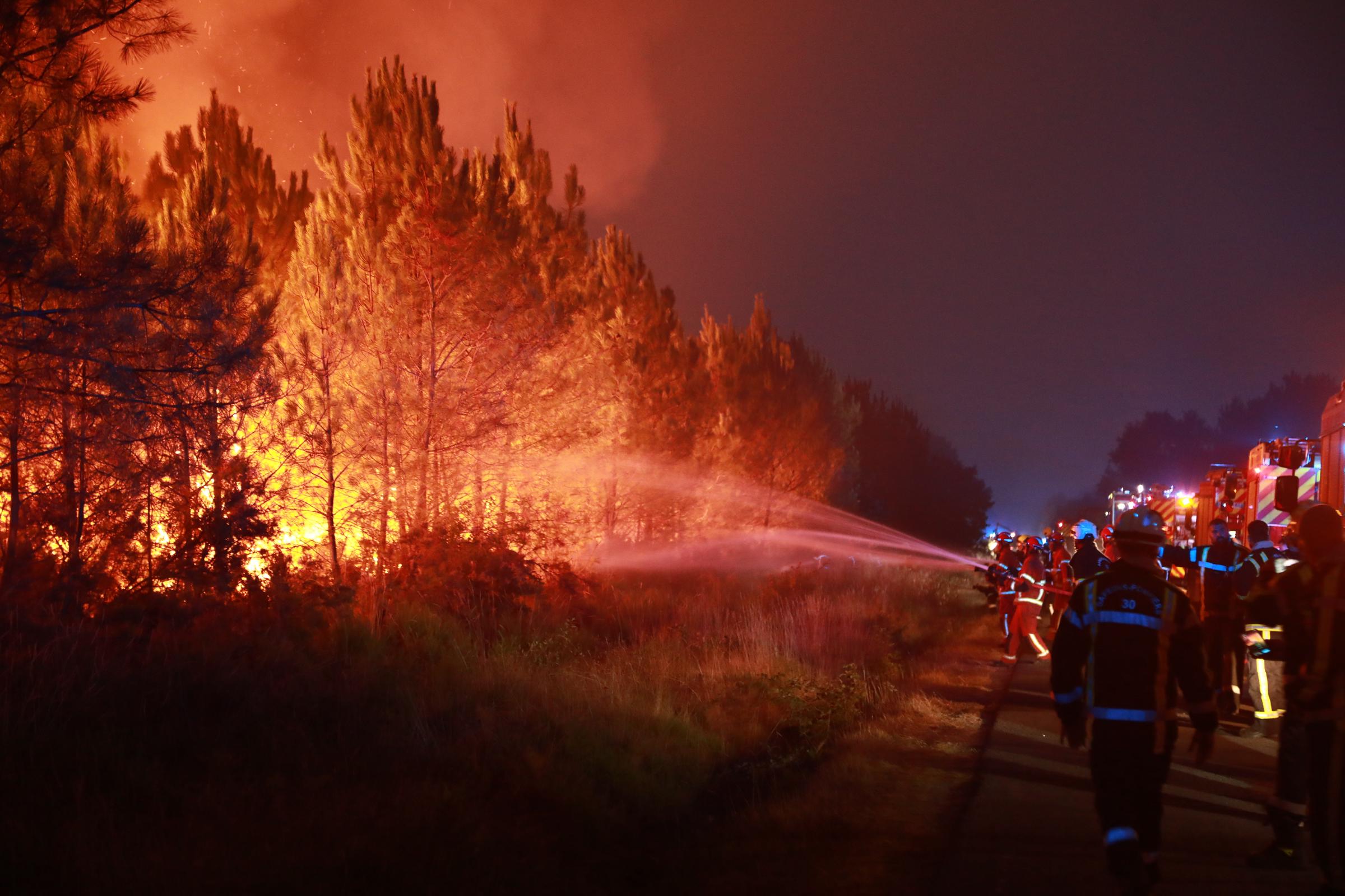 Firefighters continue battling a wildfire near the town of Mirabel-et-Blacons in southeastern France on July 28, 2026. | Source: Getty Images