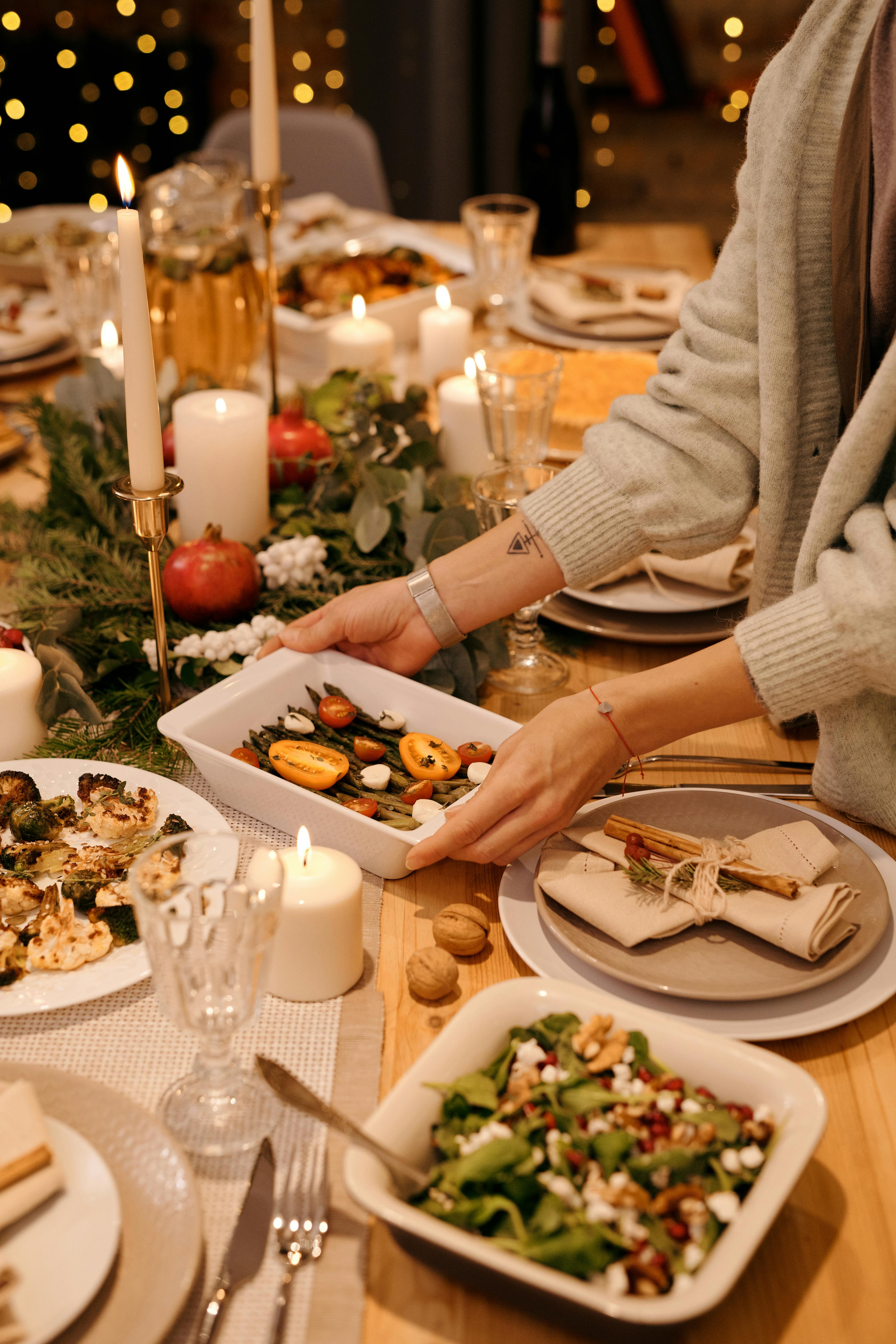 A woman serving dinner | Source: Pexels