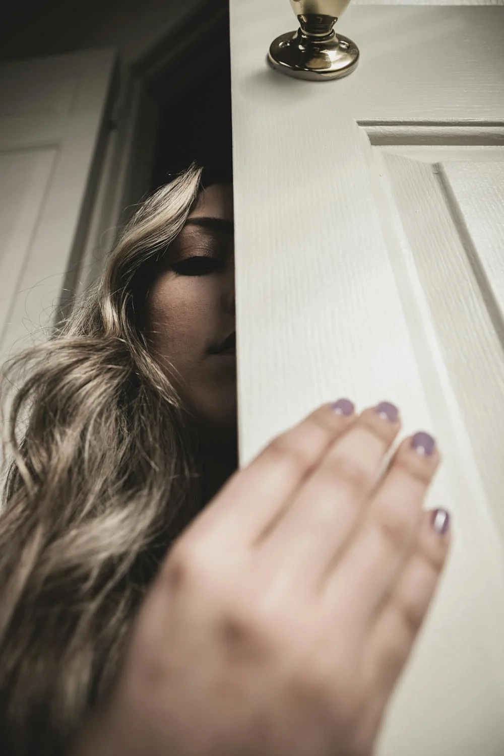 A woman sneaking | Source: Pexels