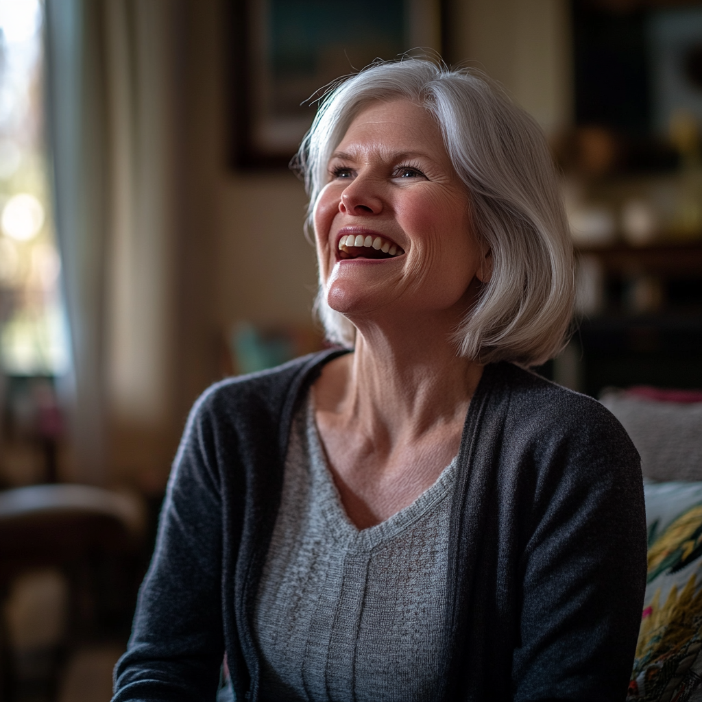 A senior woman laughs slyly while looking at someone | Source: Midjourney