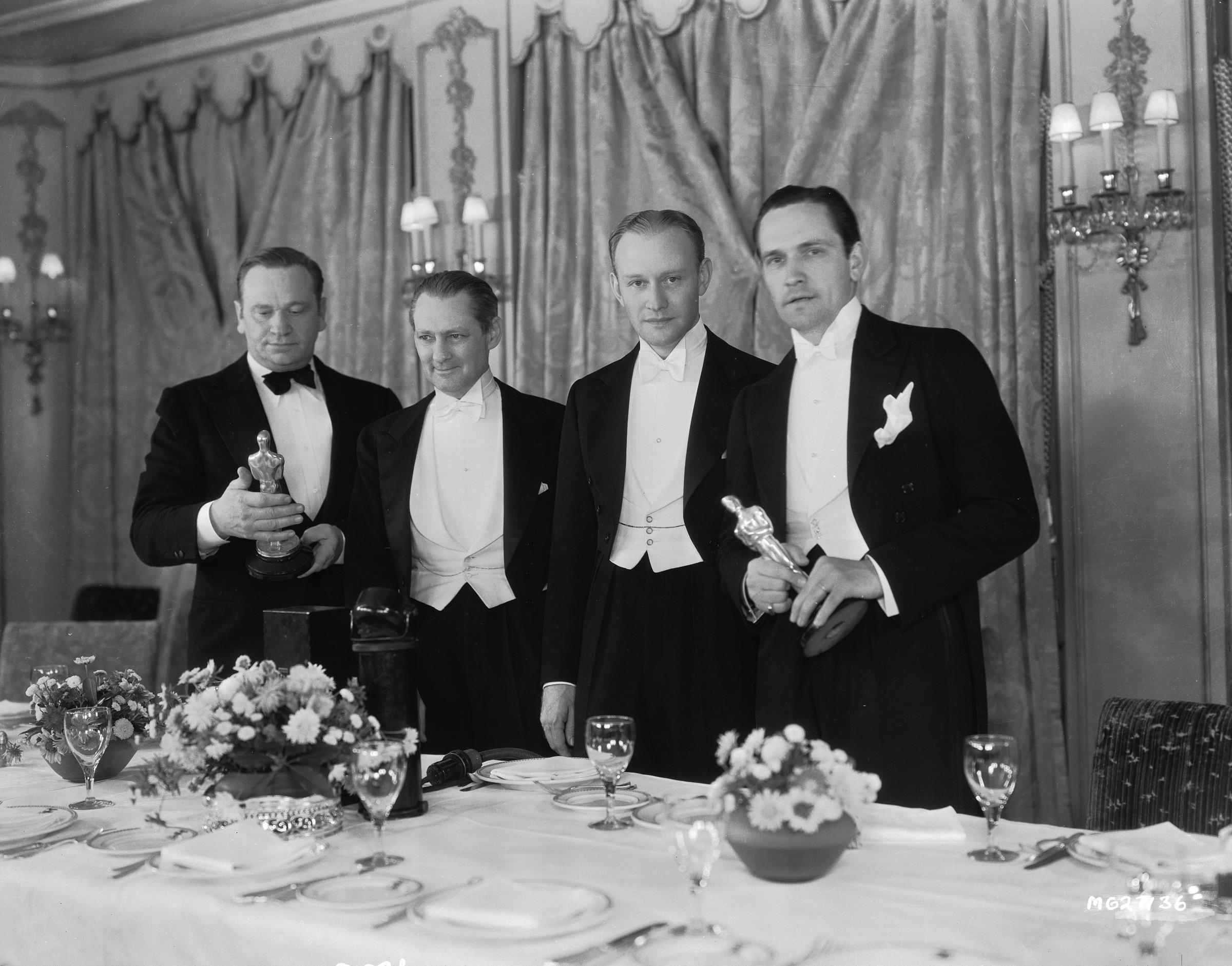 Wallace Beery (1885 - 1949), Lionel Barrymore (1878 - 1954), Conrad Nagel (1897 - 1970) and Fredric March (1897 - 1975) at the 1932 Academy Awards. | Source: Getty Images