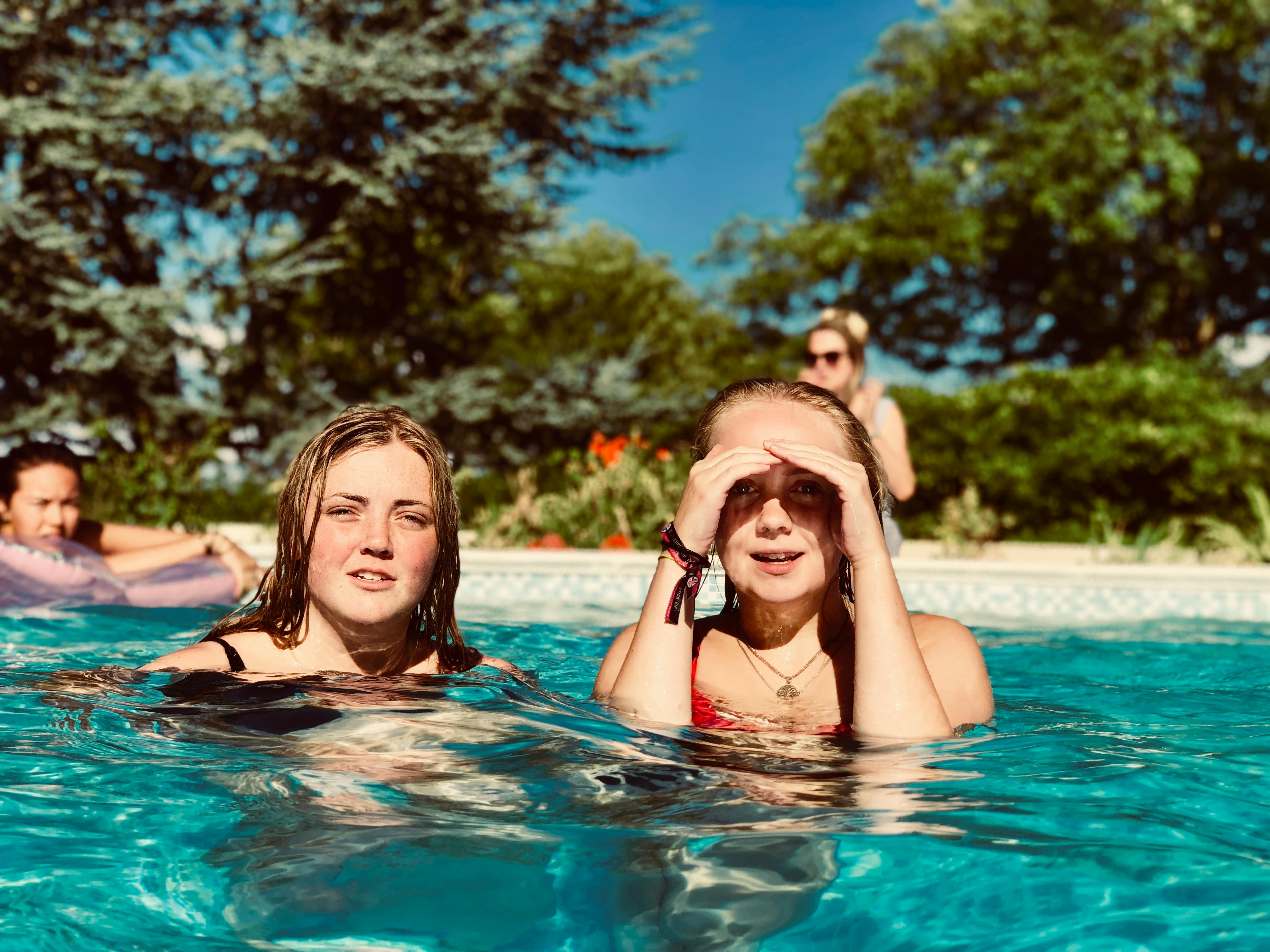 People in a pool | Source: Pexels
