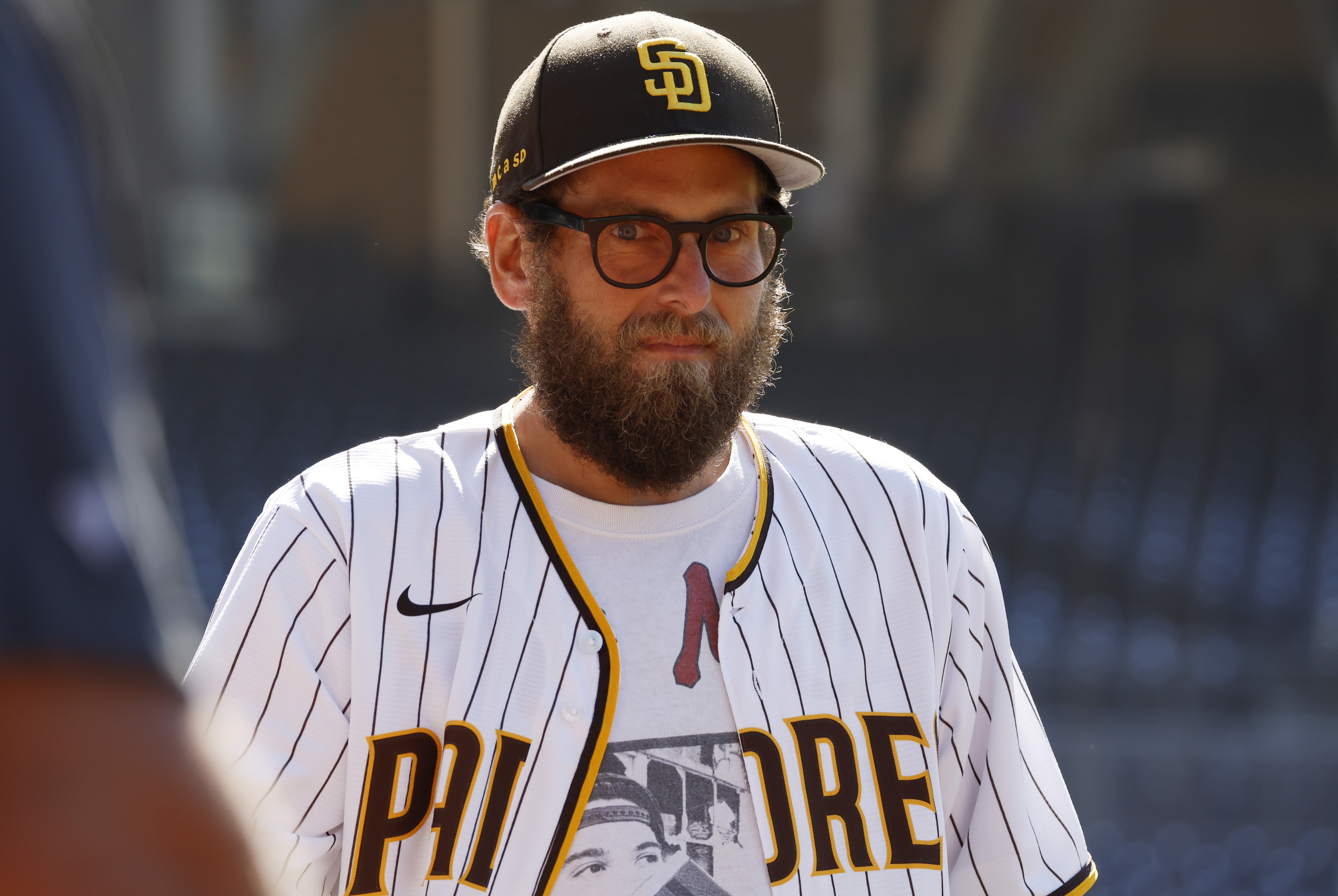 Jonah Hill walks on the field after the San Diego Padres played the New York Mets at Petco Park on July 30, 2025 in San Diego, California. | Source: Getty Images