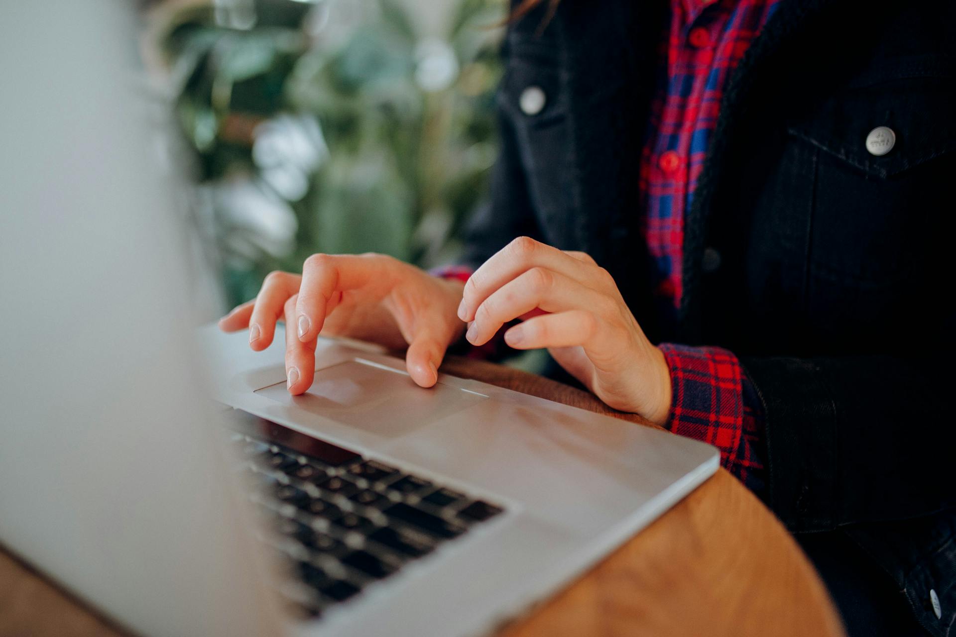 A woman looking for a job on her laptop | Source: Pexels