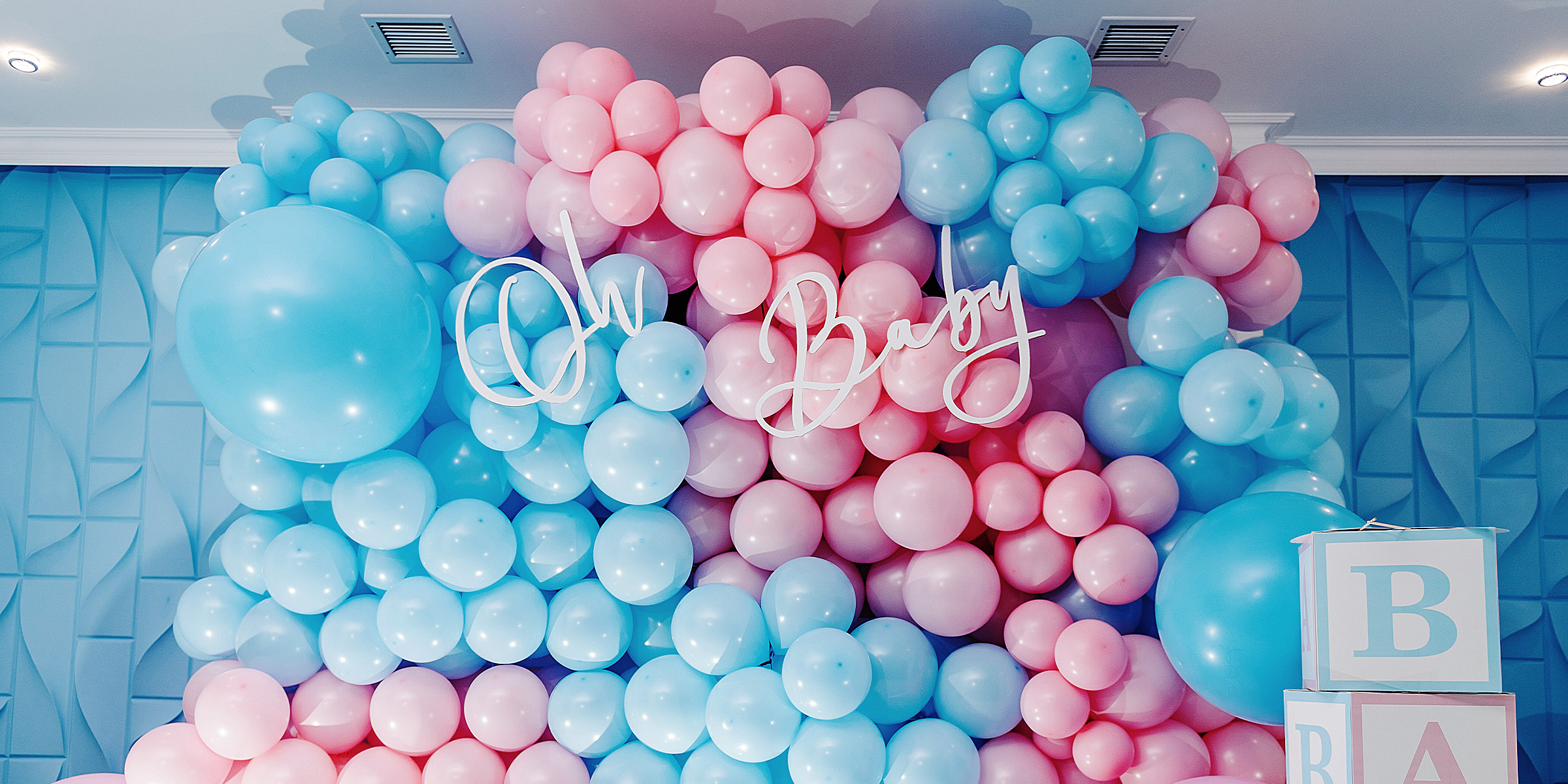 Blue and pink baby shower decorations | Source: Shutterstock