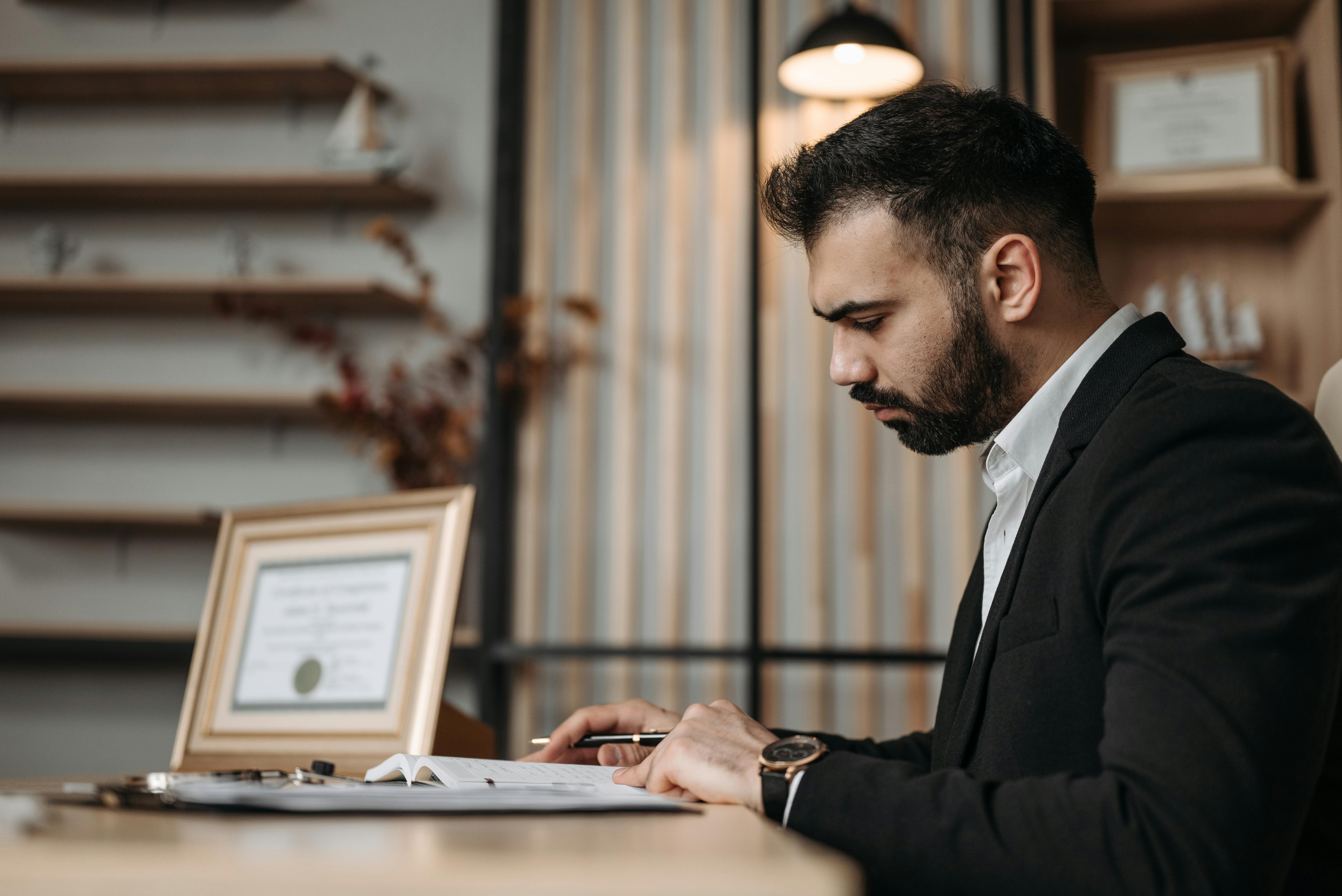 A lawyer reading a document | Source: Pexels