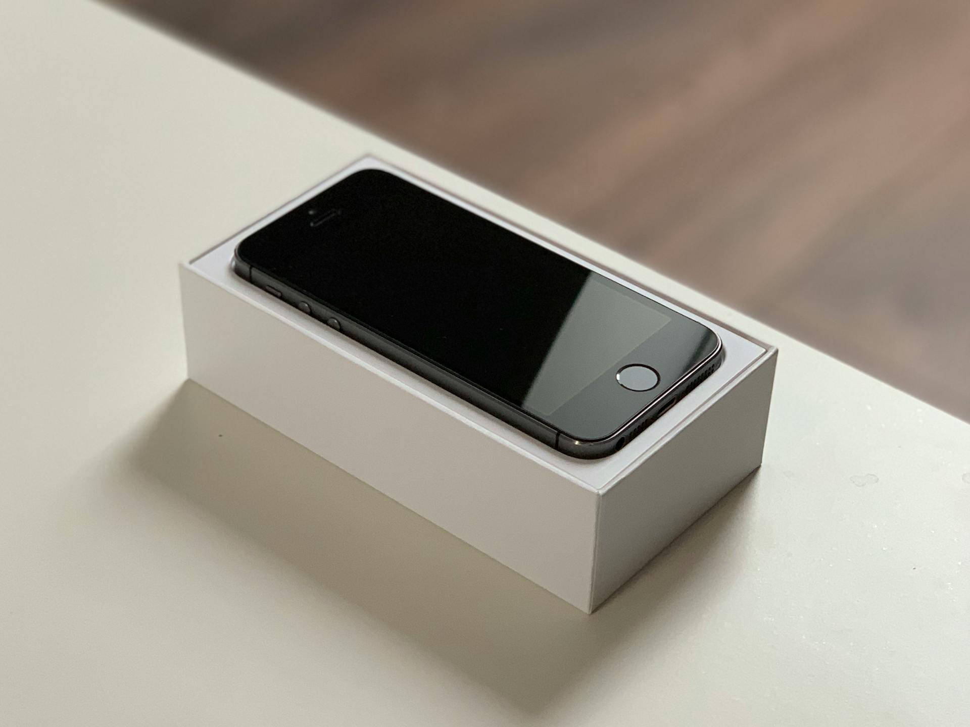 A new phone on top of its box | Source: Pexels
