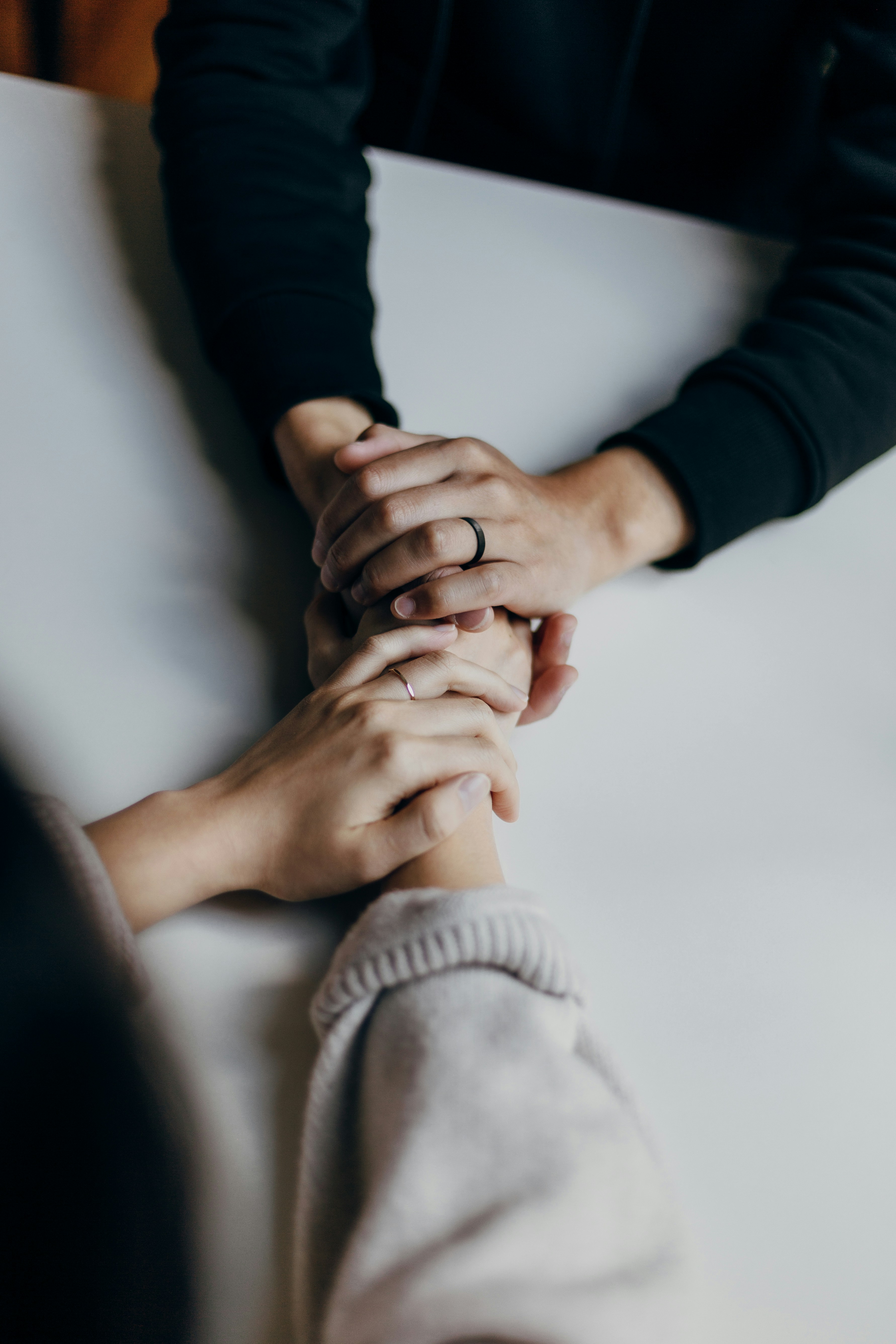 Two people holding hands | Source: Unsplash