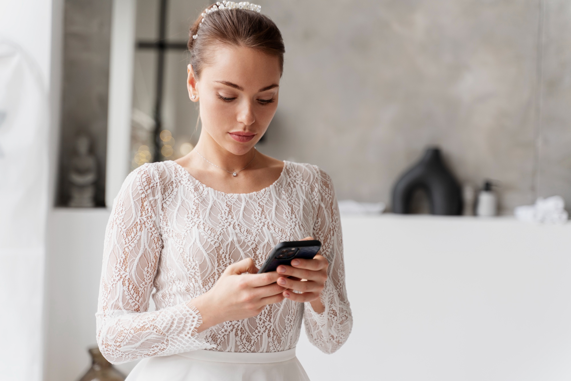 A bride holding her phone | Source: Freepik