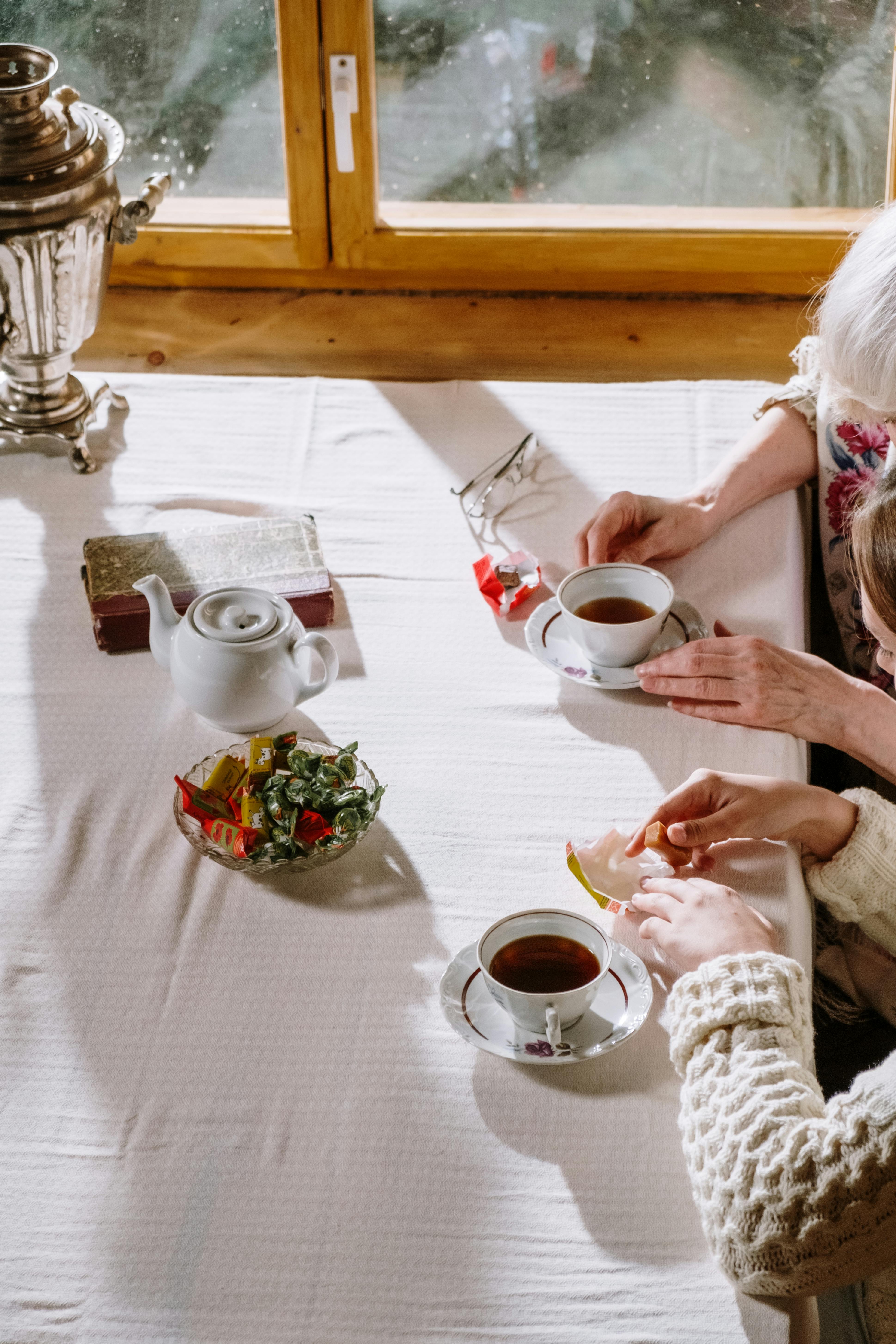 Two women drinking tea | Source: Pexels