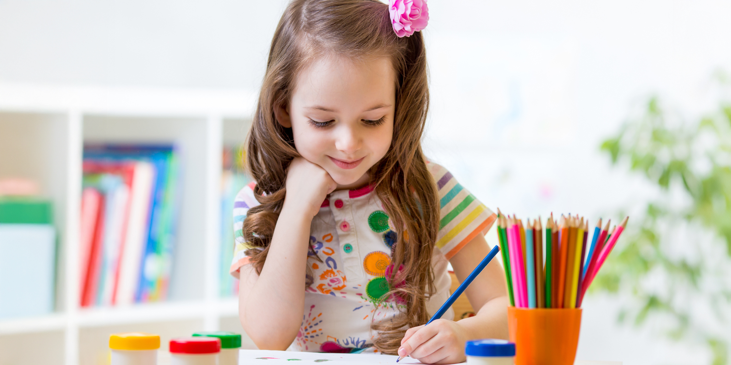 A little girl drawing | Source: Shutterstock