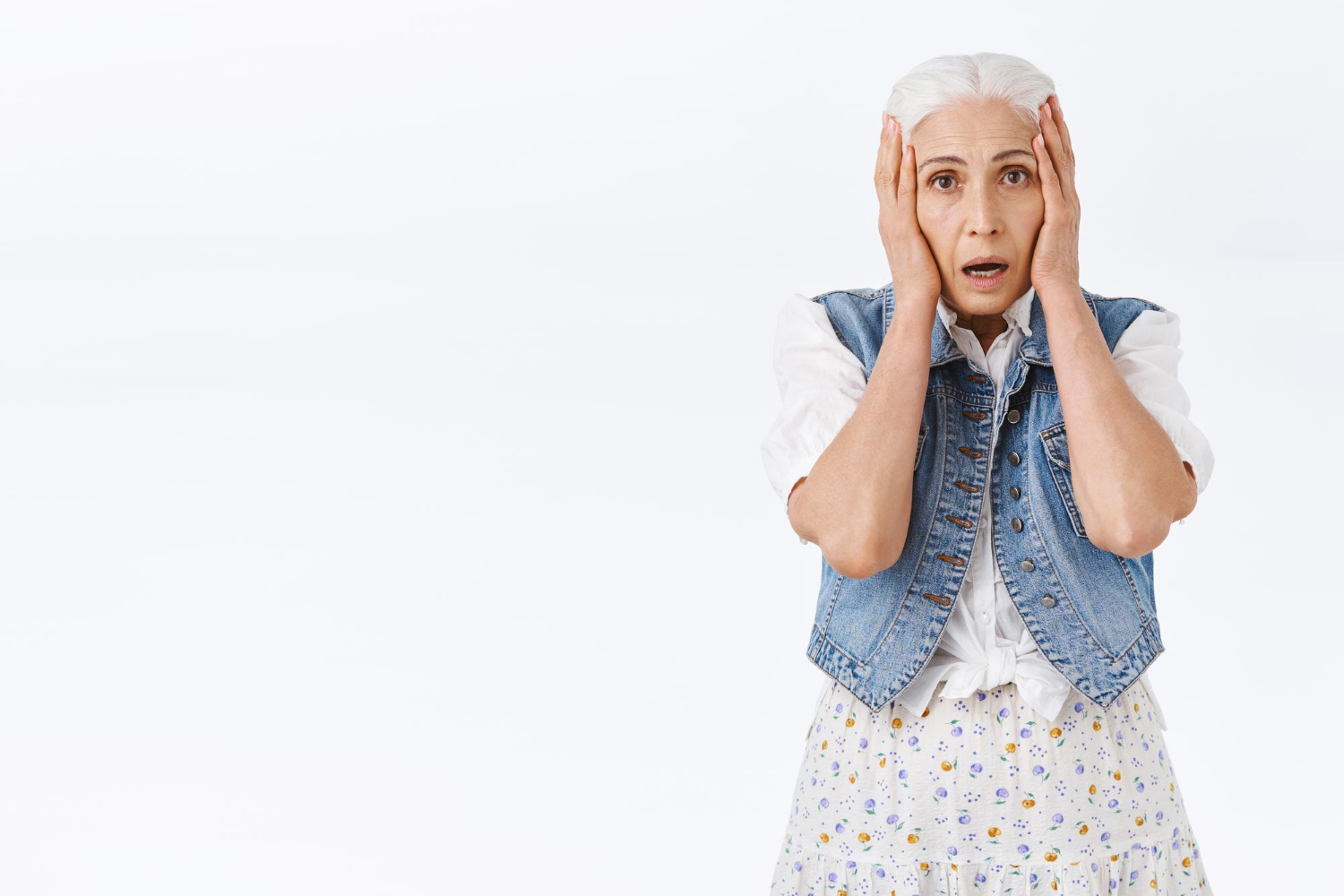 A shocked older woman | Source: Freepik