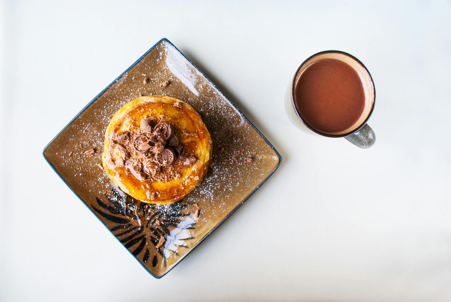 Pancakes served with chocolate | Source: Pexels