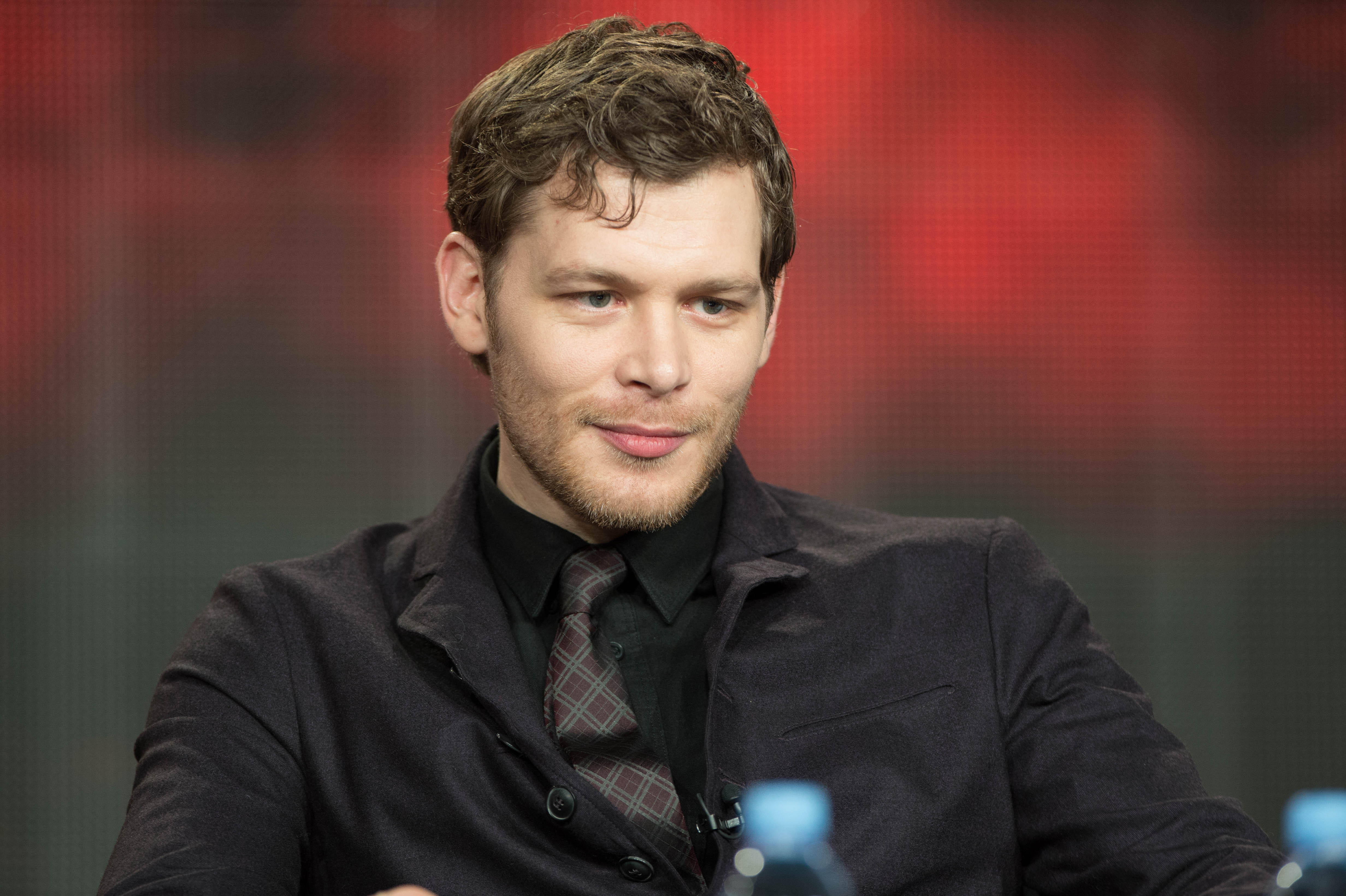 Joseph Morgan speaks onstage during 'The Vampire Diaries' and 'The Originals' panel as part of The CW 2015 Winter Television Critics Association press tour at The Langham Huntington Hotel and Spa on January 12, 2015 in Pasadena, California. | Source: Getty Images