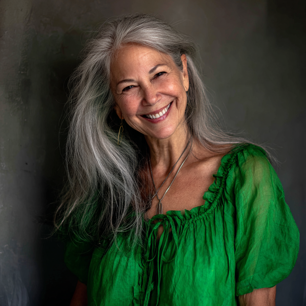 A smiling woman wearing a green dress | Source: Midjourney