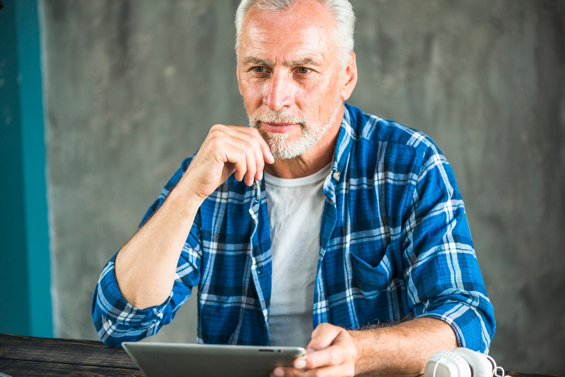 A middle-aged man working | Source: Freepik