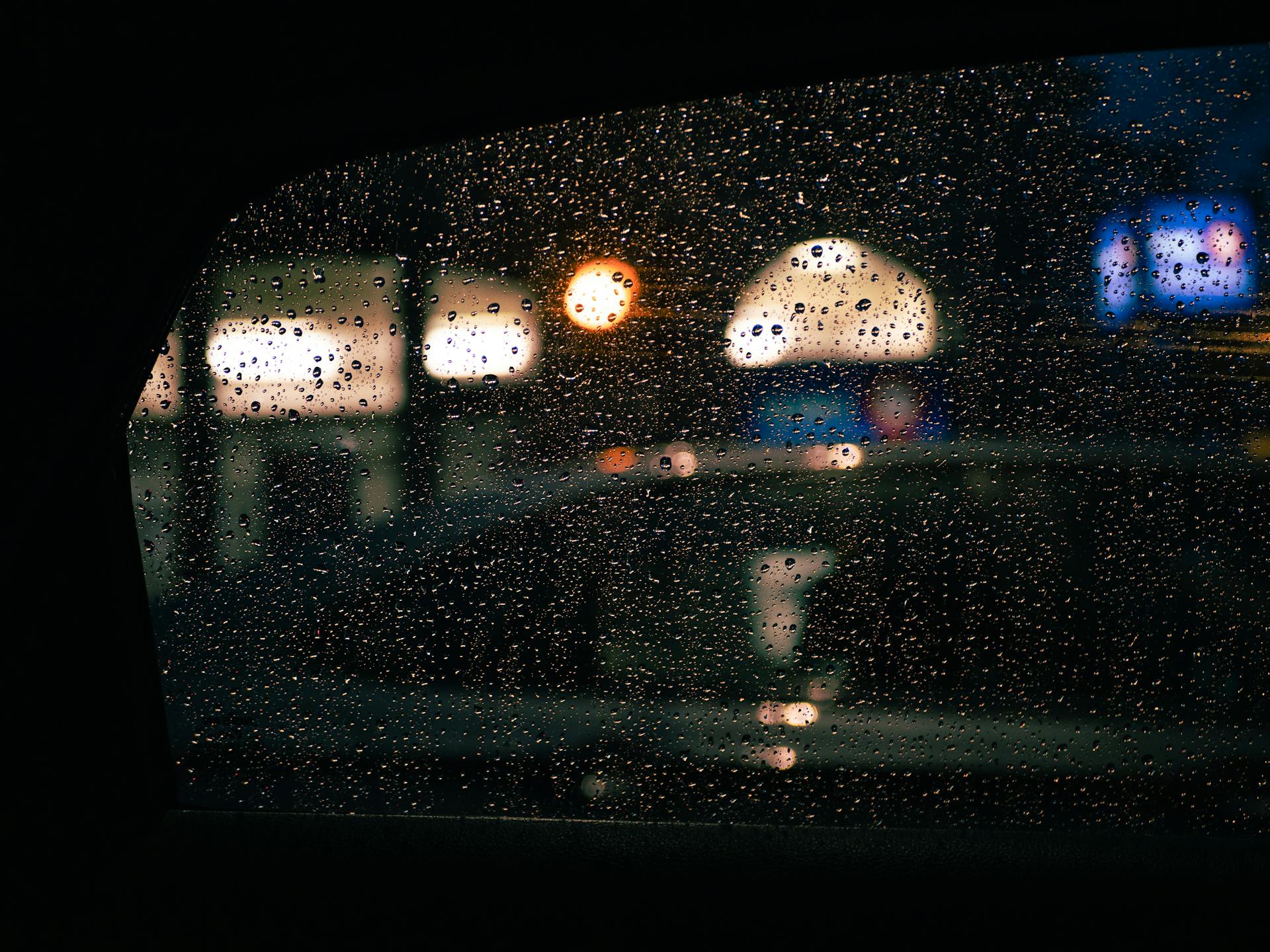 Rain drops on a car window | Source: Midjourney