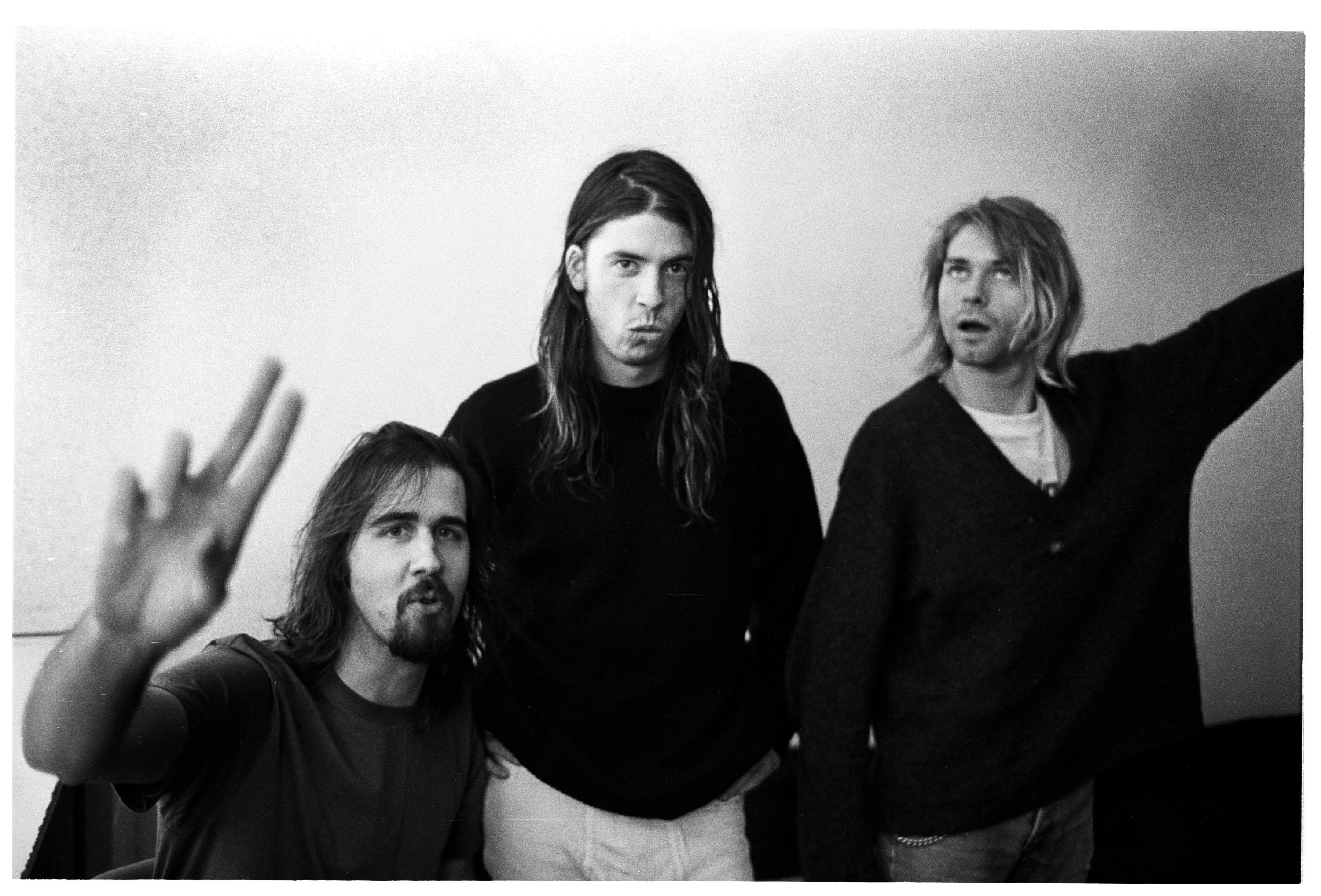 Krist Novoselic, Dave Grohl, and Kurt Cobain of Nirvana photographed in Vooruit, Gent, Belgium, on November 23, 1991. | Source: Getty Images