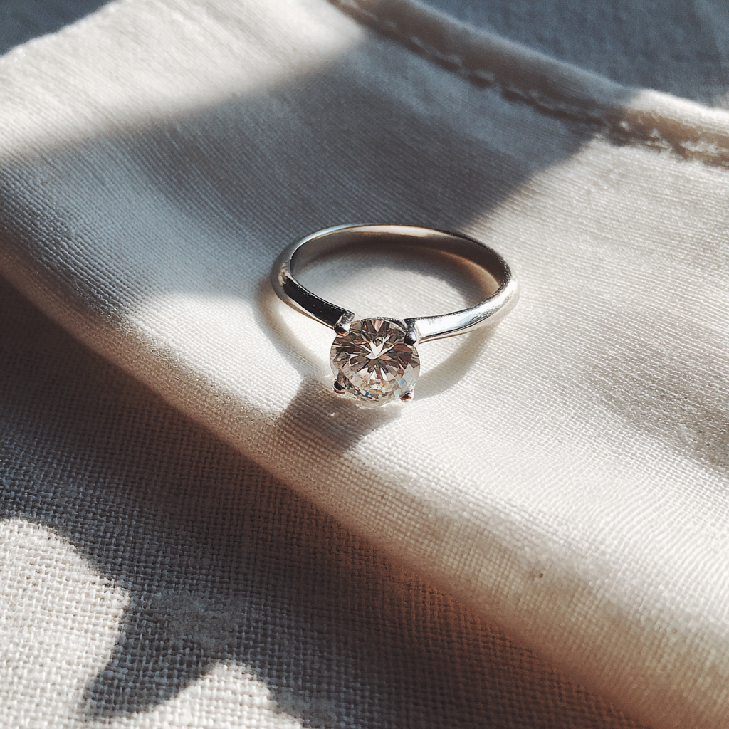 An engagement ring on a napkin | Source: Midjourney