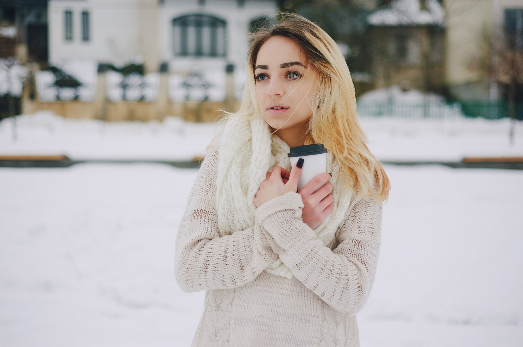 A serious woman outside in the snow | Source: Freepik