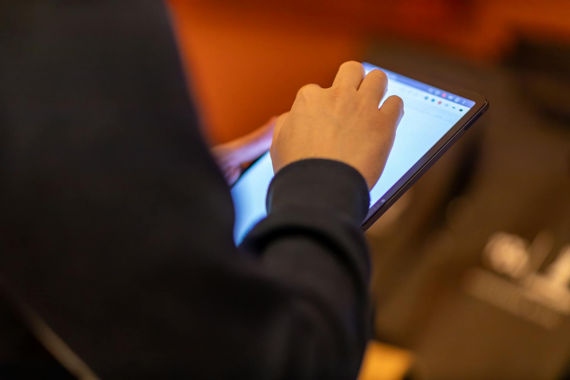 My Dad Invited My Brother and Me to His Wedding to the Woman He Cheated on Our Mom With – He Had No Idea He'd Regret It Soon 13 A person holding a tablet | Source: Pexels