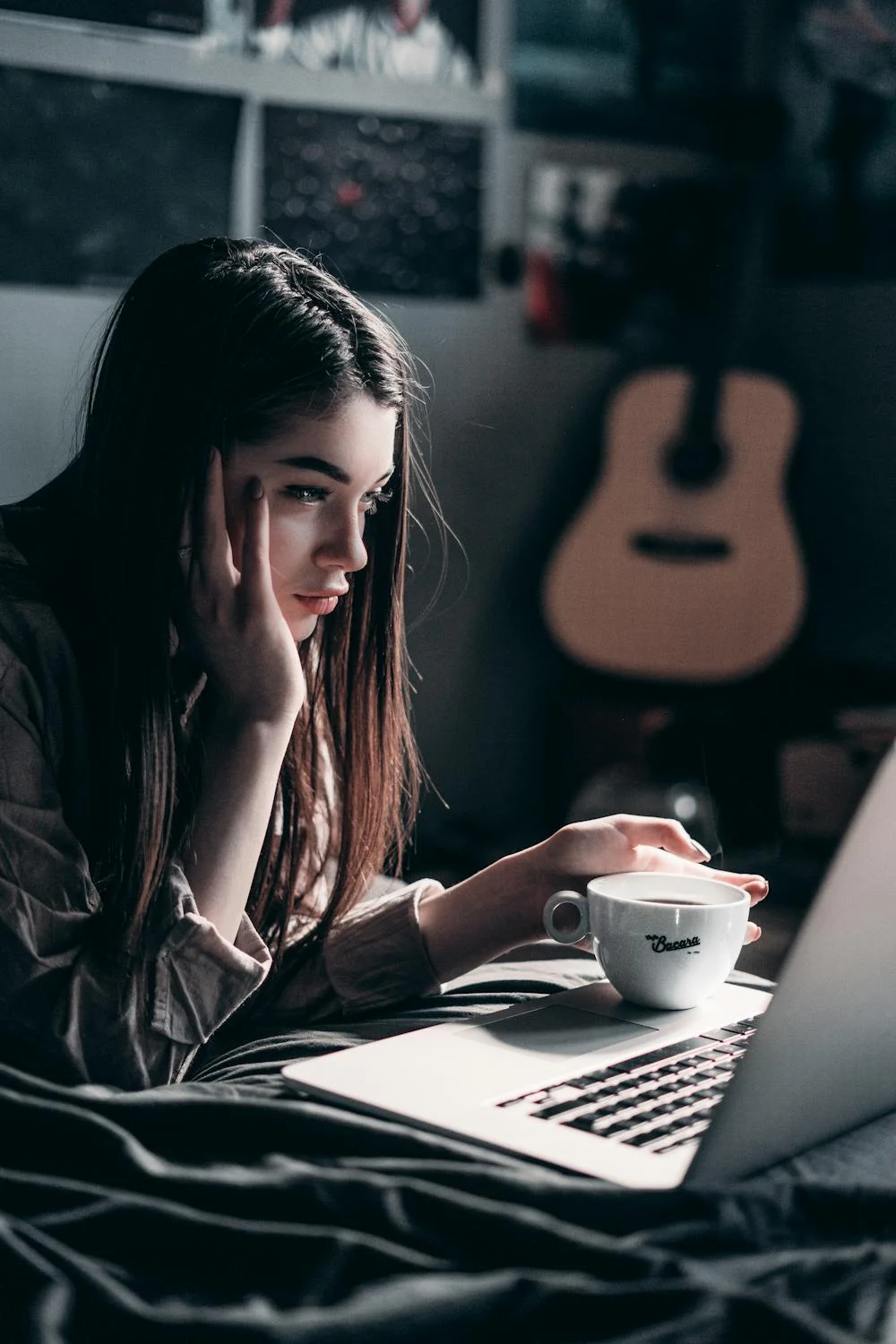 A serious woman looking at her laptop | Source: Pexels