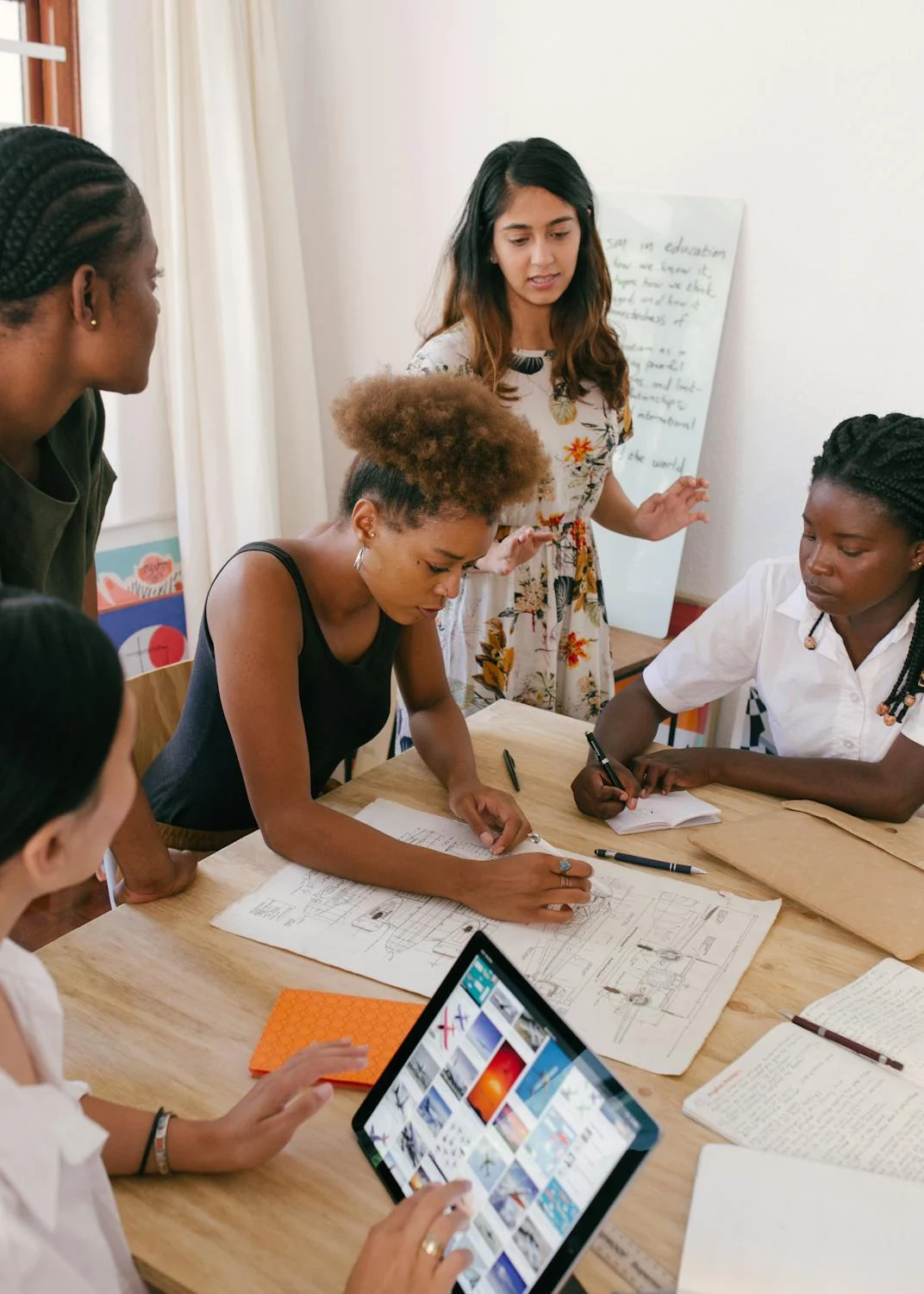 Women working on a project | Source: Pexels