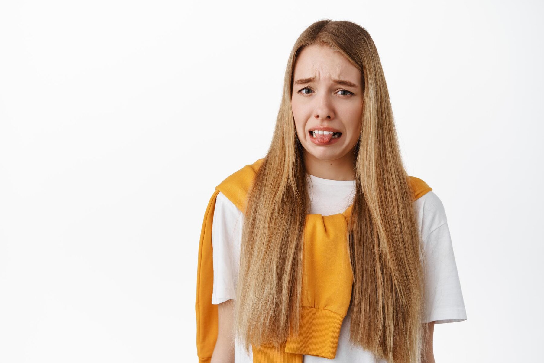 A disgusted teenage girl | Source: Freepik