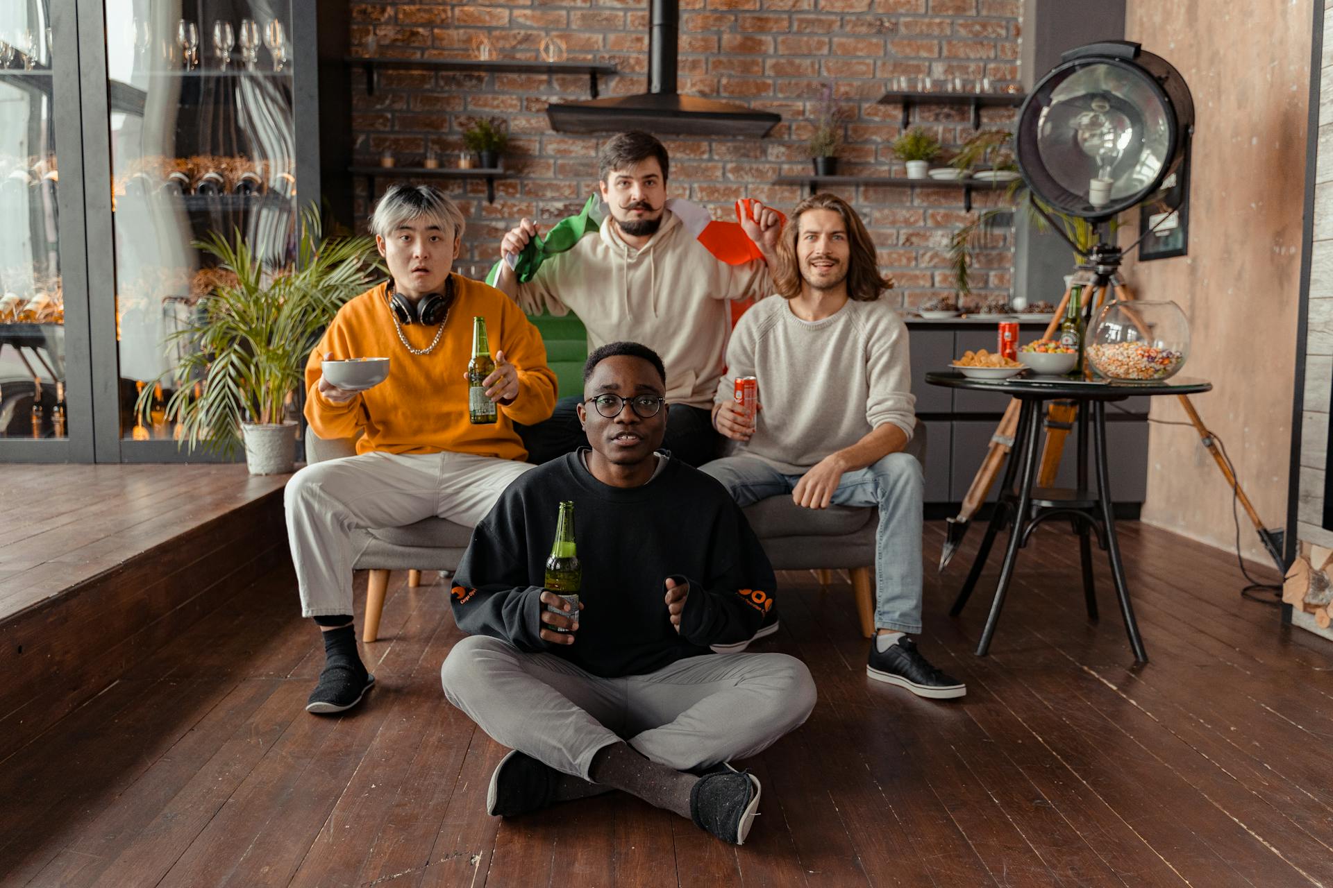 A group of men watching TV together | Source: Pexels