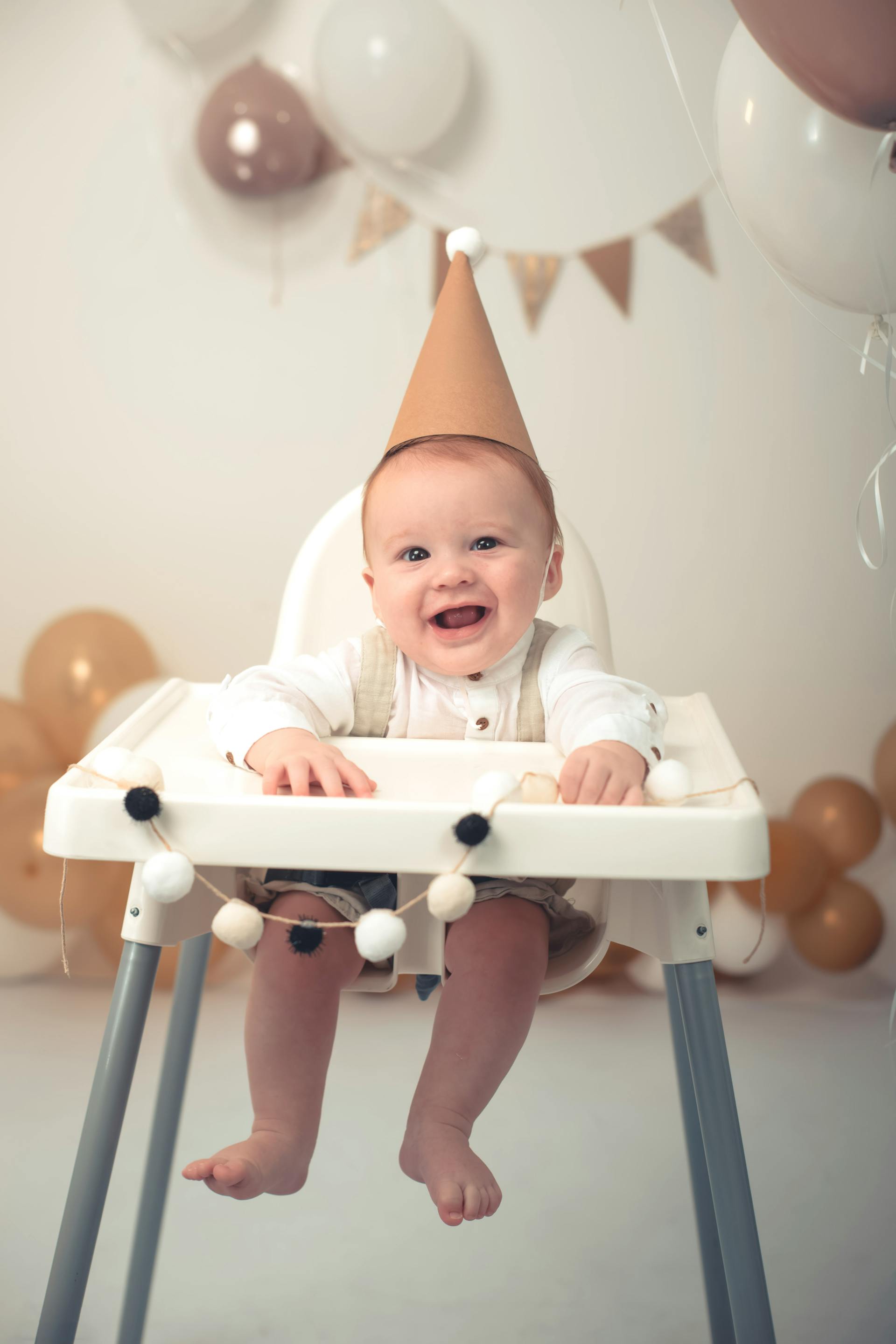 A baby boy sitting in a chair | Source: Pexels
