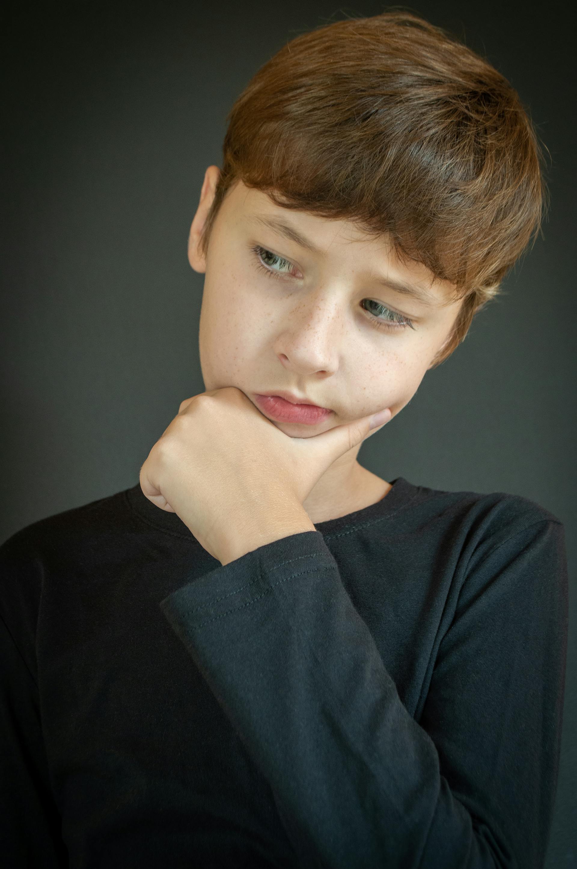 A thoughtful teenage boy | Source: Pexels