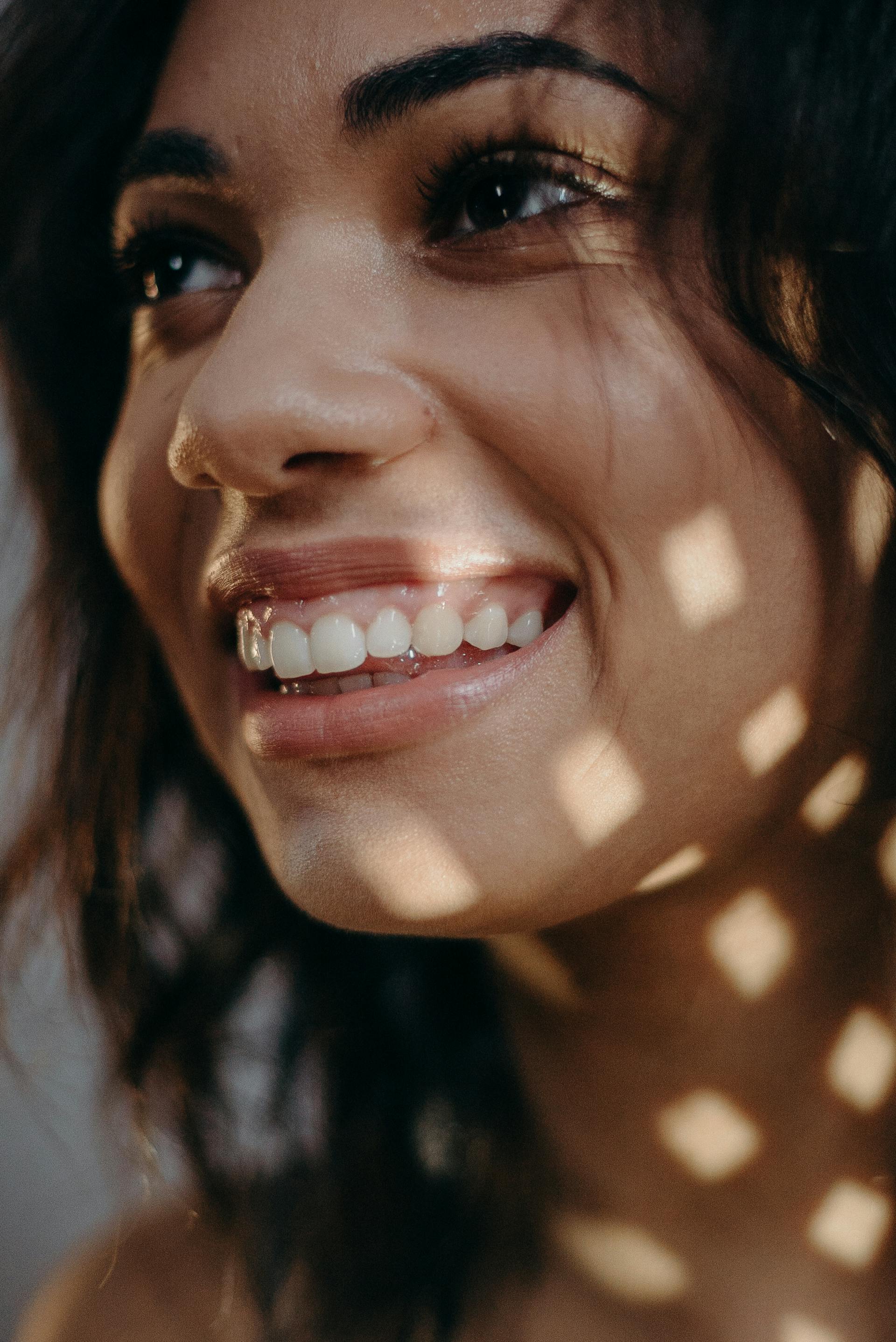 A woman smiling at someone | Source: Pexels