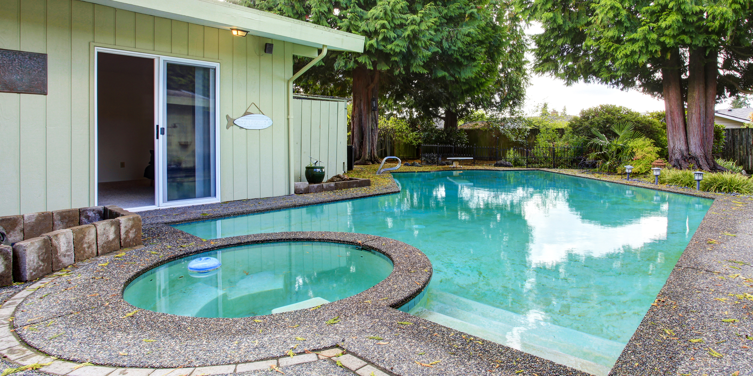 A backyard pool | Source: Shutterstock