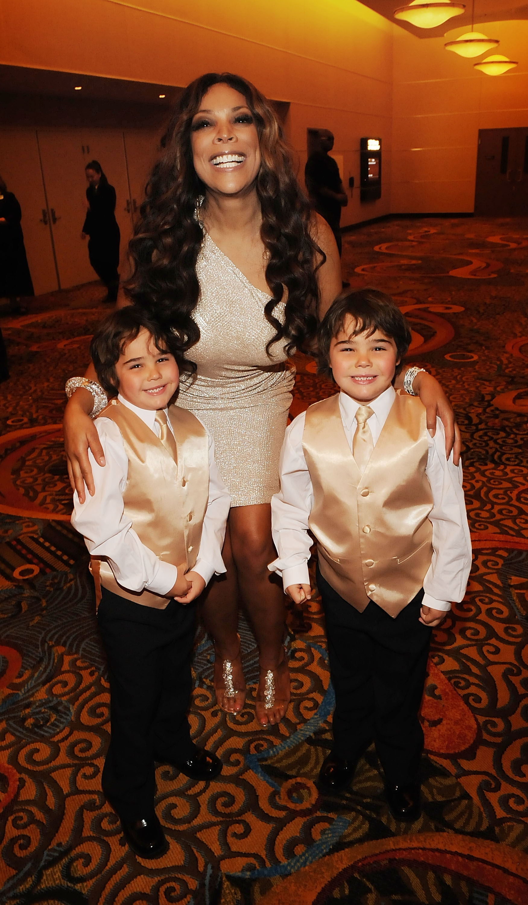 Wendy Williams with Kenny Rogers' twin sons at the Kenny Rogers: The First 50 Years award show on April 10, 2010, in Ledyard Center, Connecticut. | Source: Getty Images