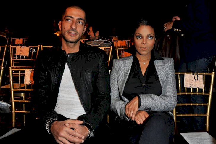Wissam Al Mana and Janet Jackson attend the John Galliano Ready to Wear Spring/Summer 2011 show during Paris Fashion Week at Opera Comique on October 3, 2010 in Paris, France. | Photo by Pascal Le Segretain/Getty Images