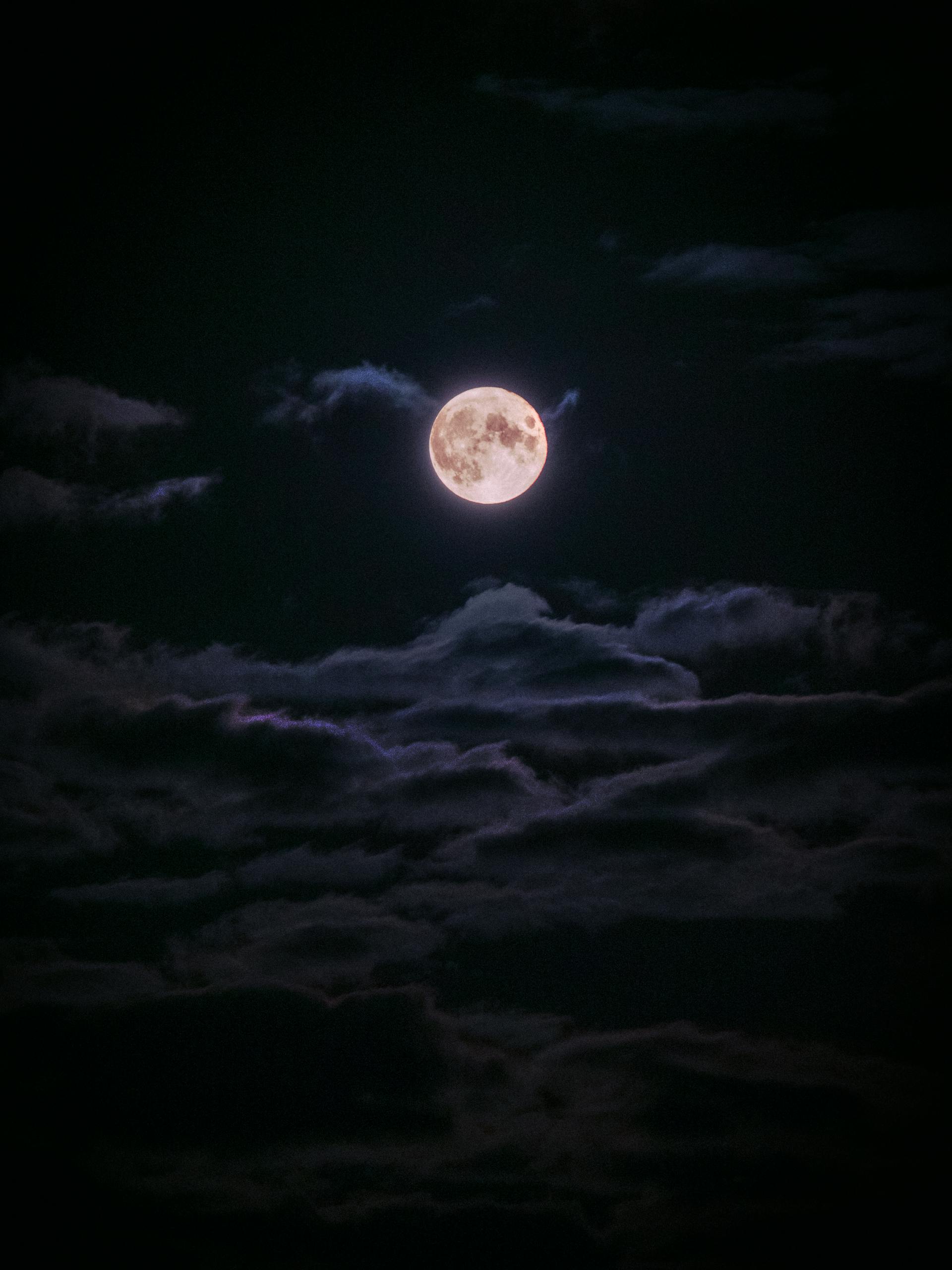 View of full moon in the night sky | Source: Pexels