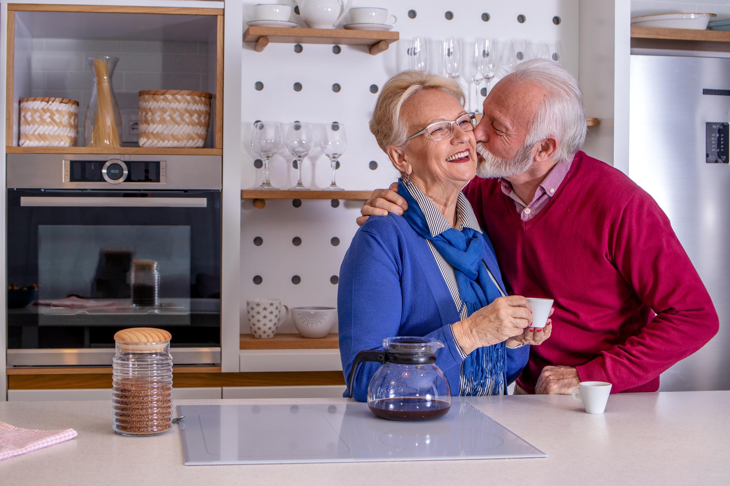 Happy senior couple having their coffee | Source: Shutterstock