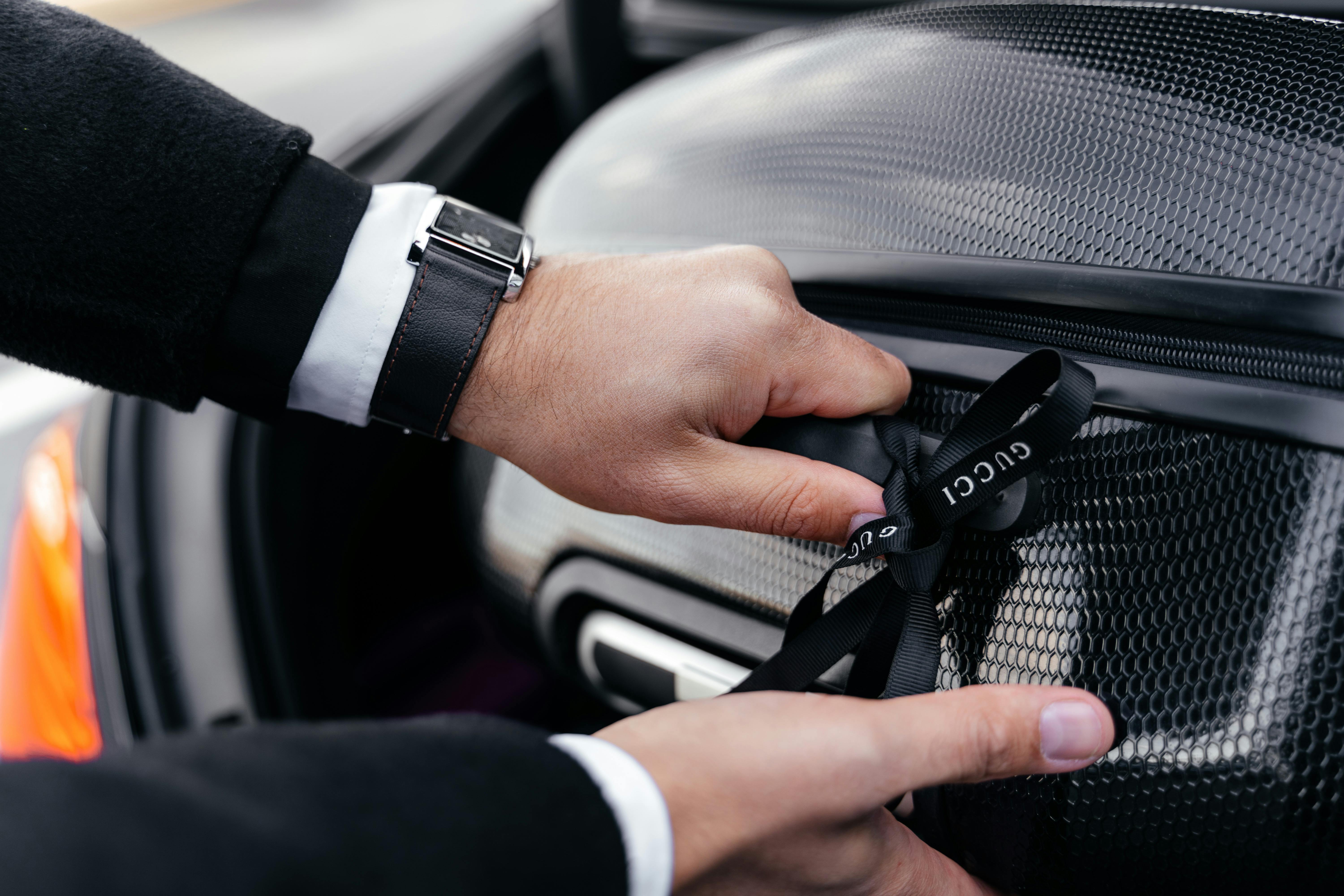 A man packing his luggage for a trip | Source: Pexels