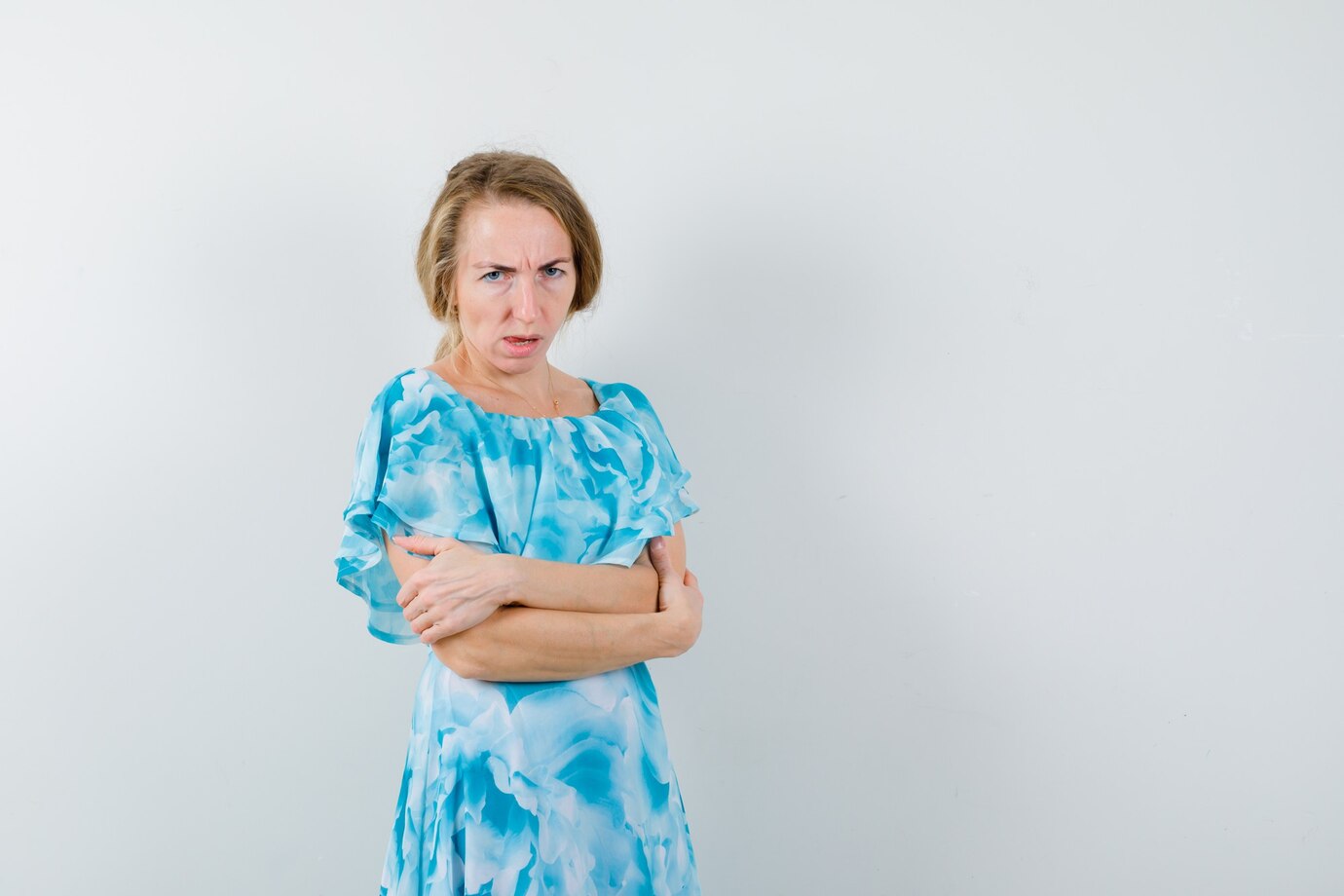 An angry woman with her arms crossed | Source: Freepik