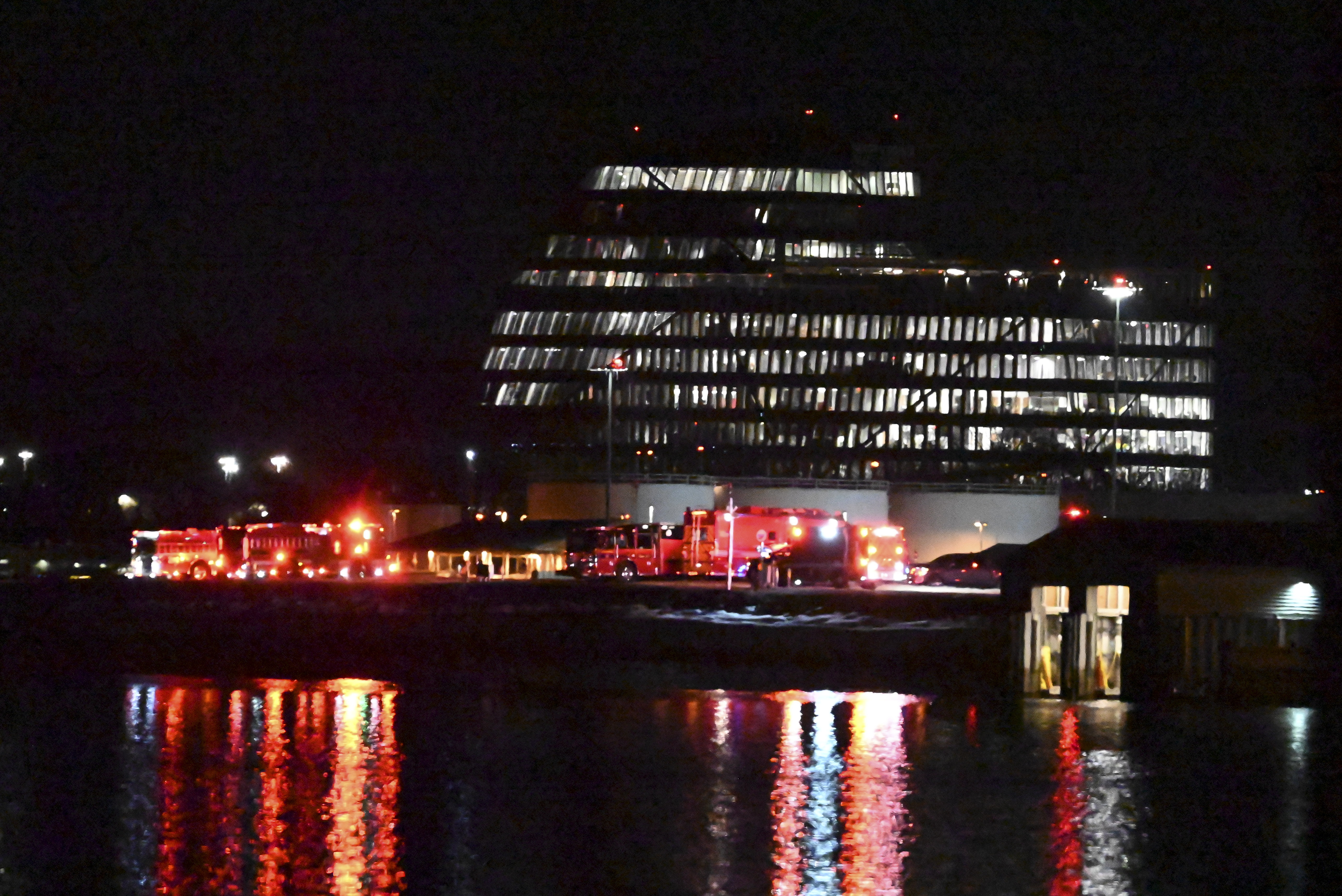 A view of the scene after a regional plane collided in midair with a military helicopter and crashed into the Potomac River in Washington, D.C., United States on January 30, 2025 | Source: Getty Images