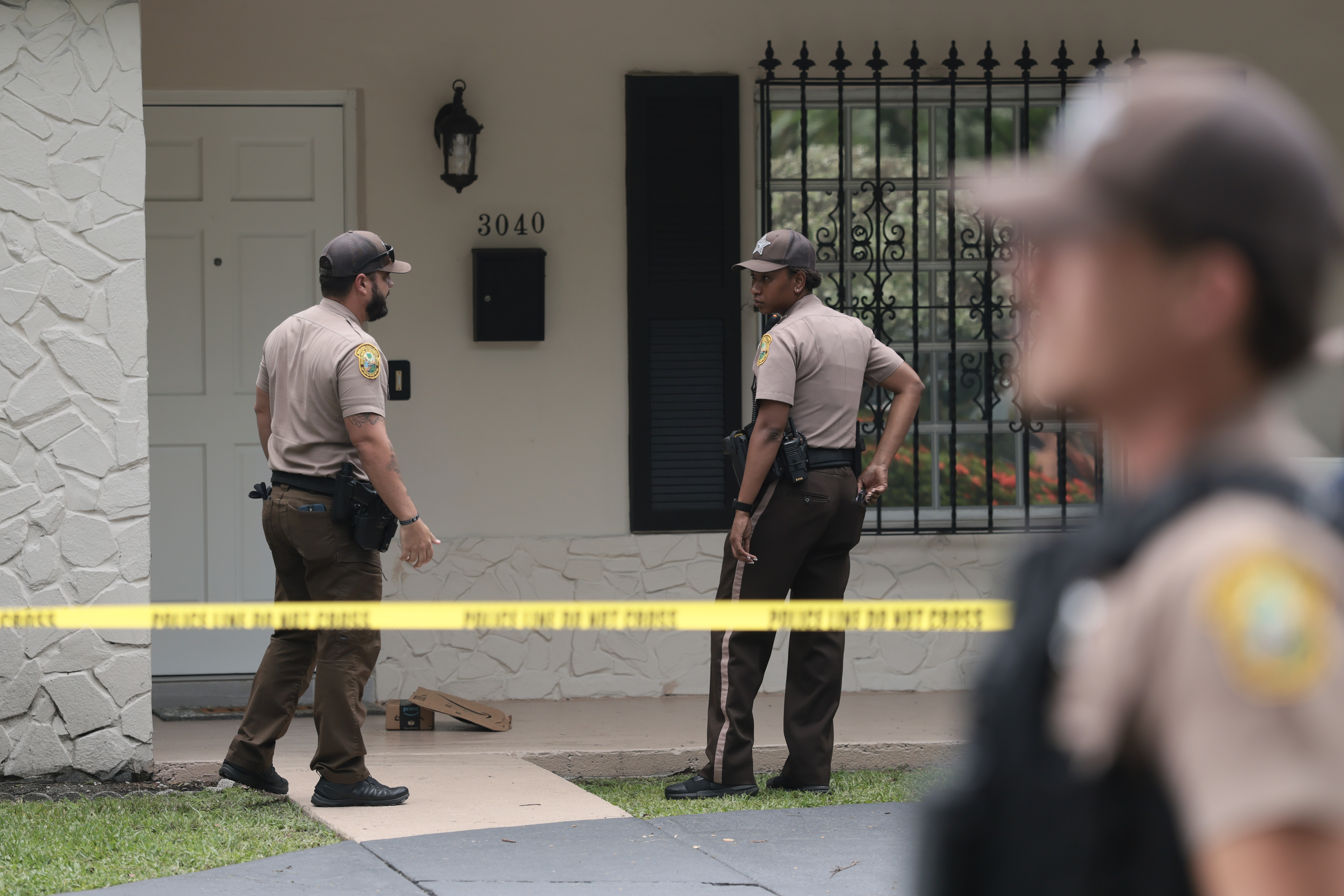 Miami-Dade County Sheriff’s deputies visit the home where Perez Hilton was found after he appeared to harm himself during a TikTok livestream on August 05, 2026, in Westchester, Florida. | Source: Getty Images