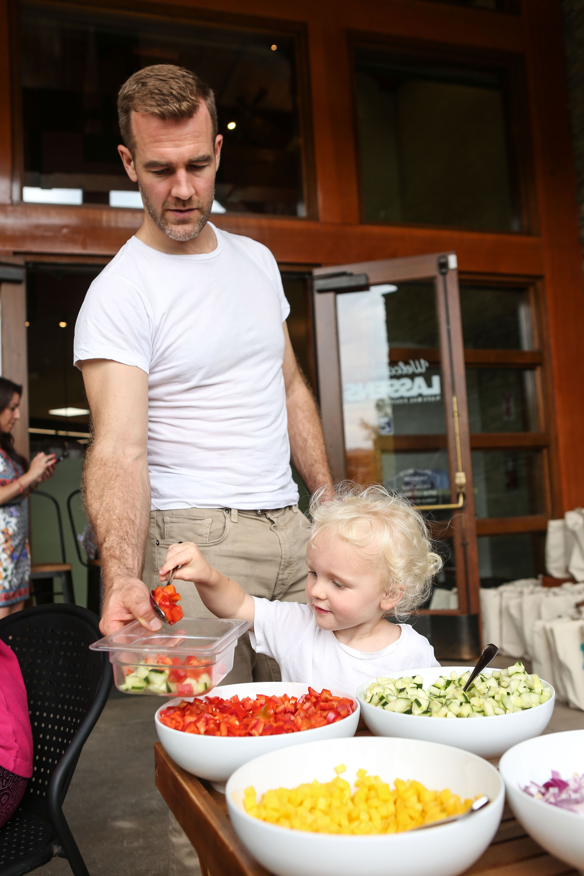 James Van Der Beek and son Joshua help out while Kimberly Van Der Beek hosts a kid-friendly cooking class  on June 9, 2015 in Thousand Oaks, California | Source: Getty Images